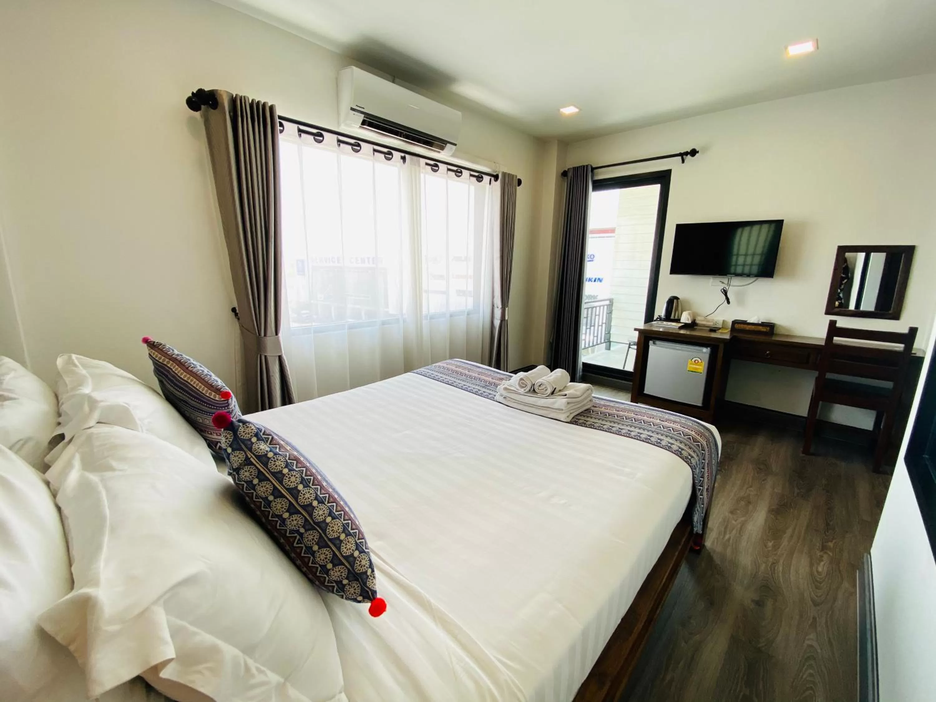 Photo of the whole room, Bed in C Hotel Boutique and Comfort