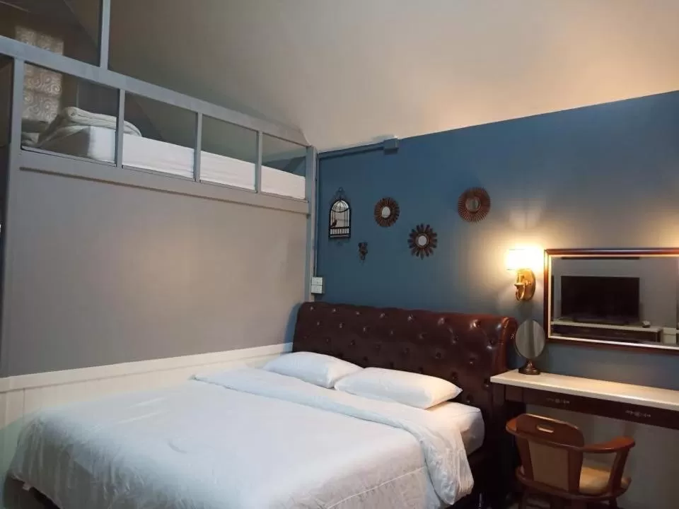 Bed in Baan JaoKorKluay บ้านเจ้ากอกล้วย