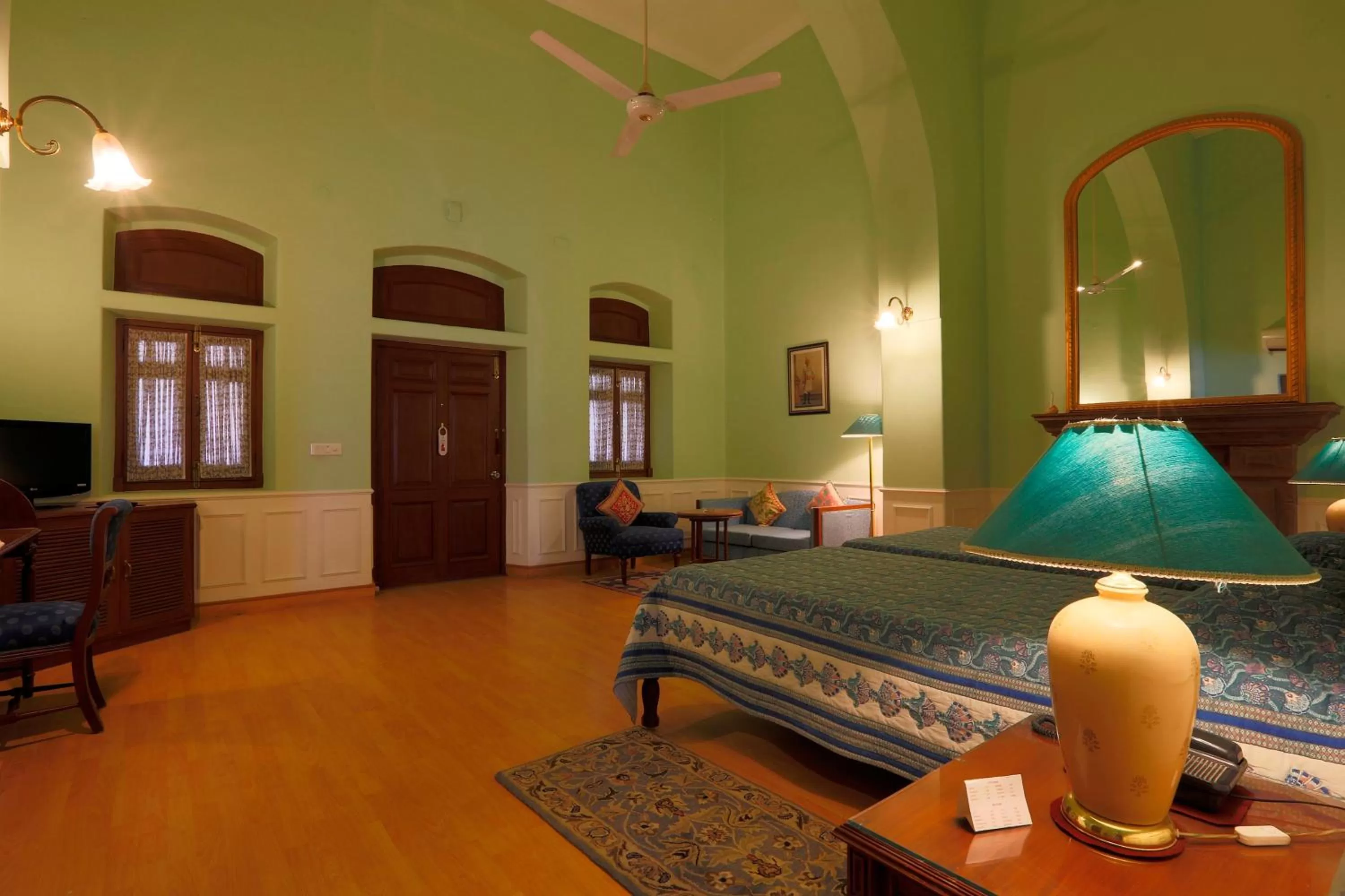 Living room, Bed in The Lallgarh Palace - A Heritage Hotel