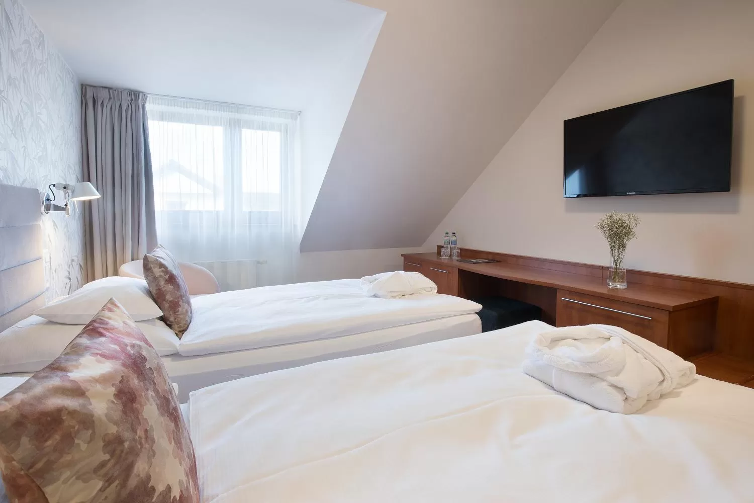 Bed in Equitana Hotel Resort