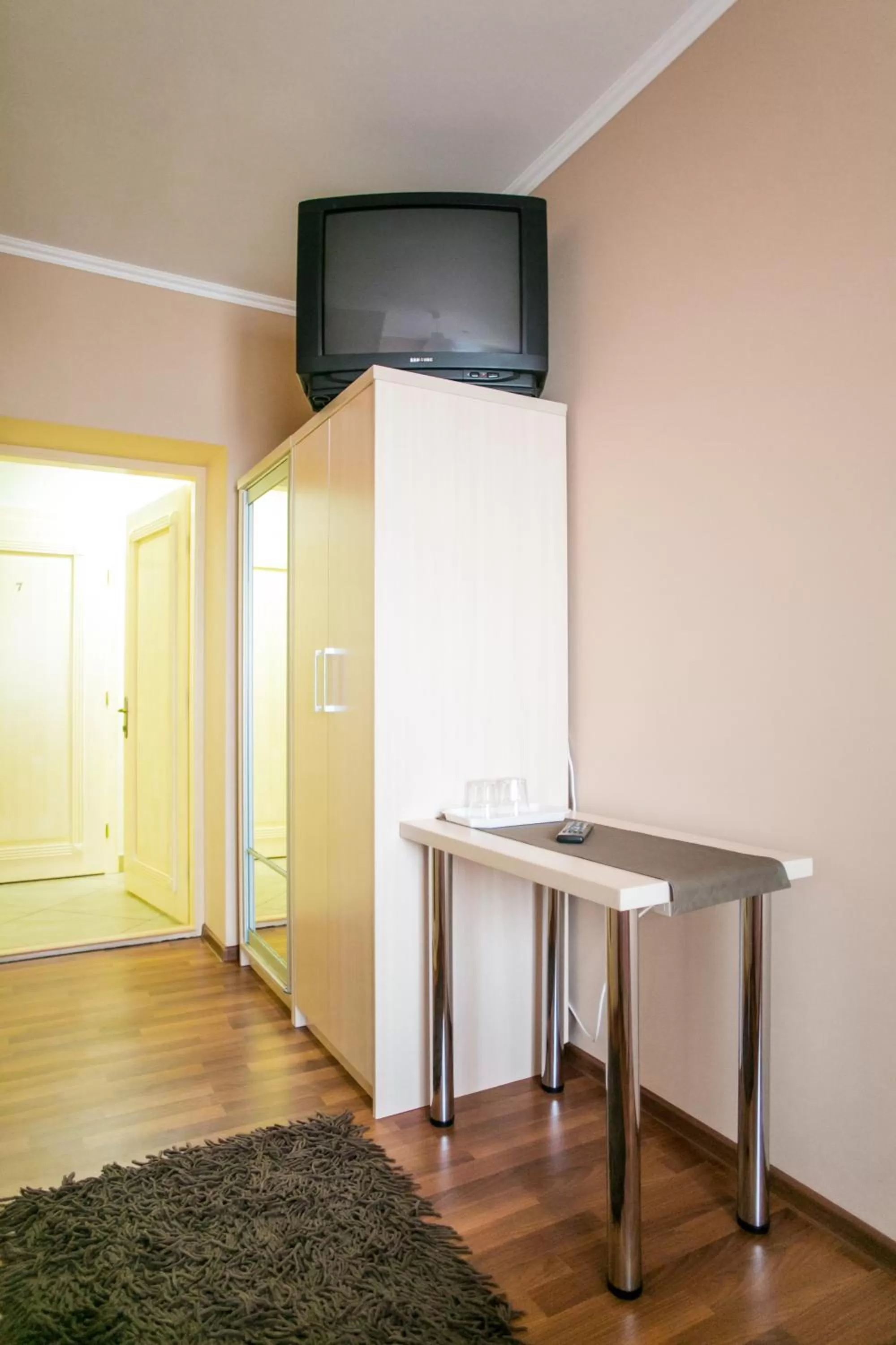 TV/Entertainment Center in Tulipan Hotel Aquapark