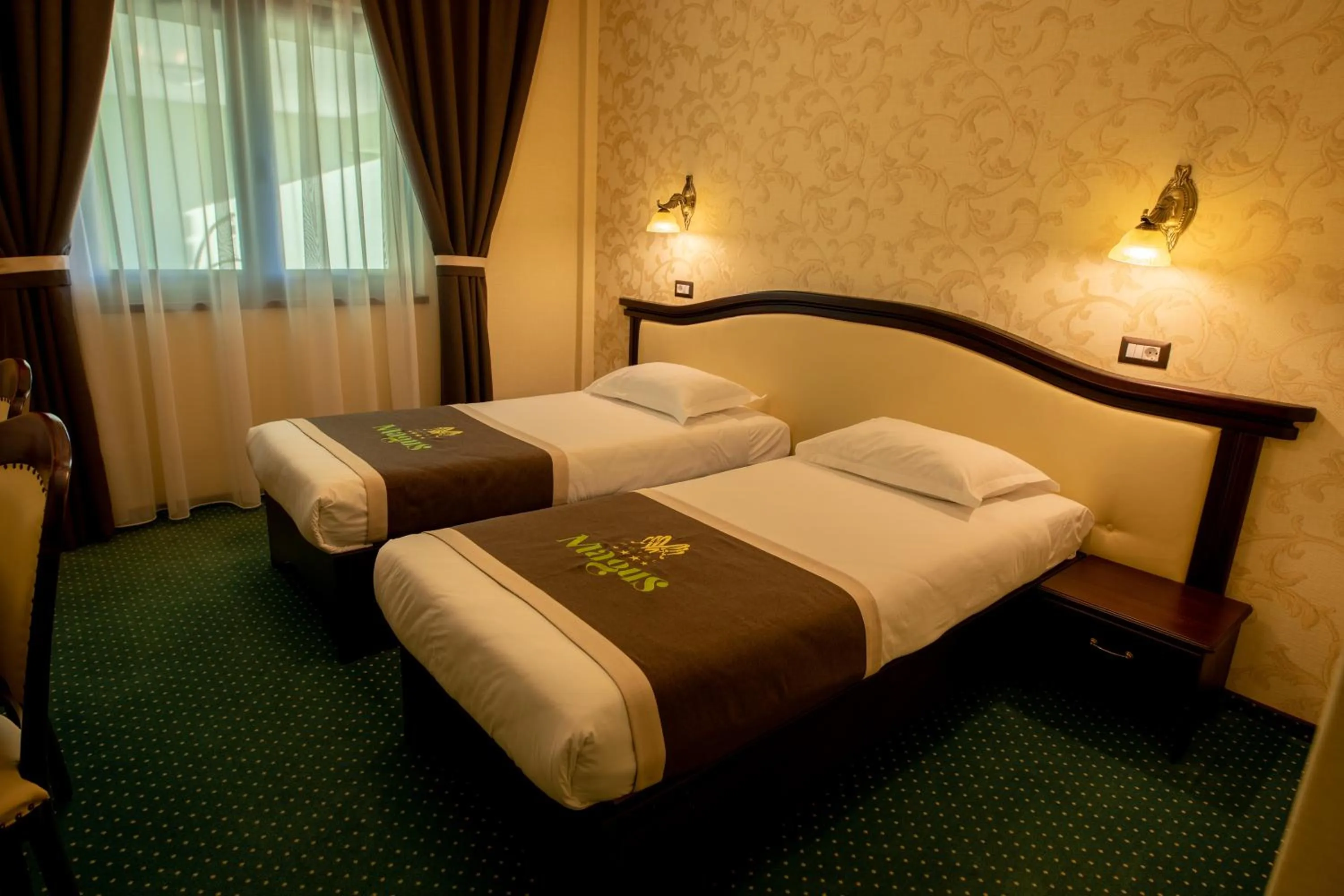 Bed in Magus Hotel