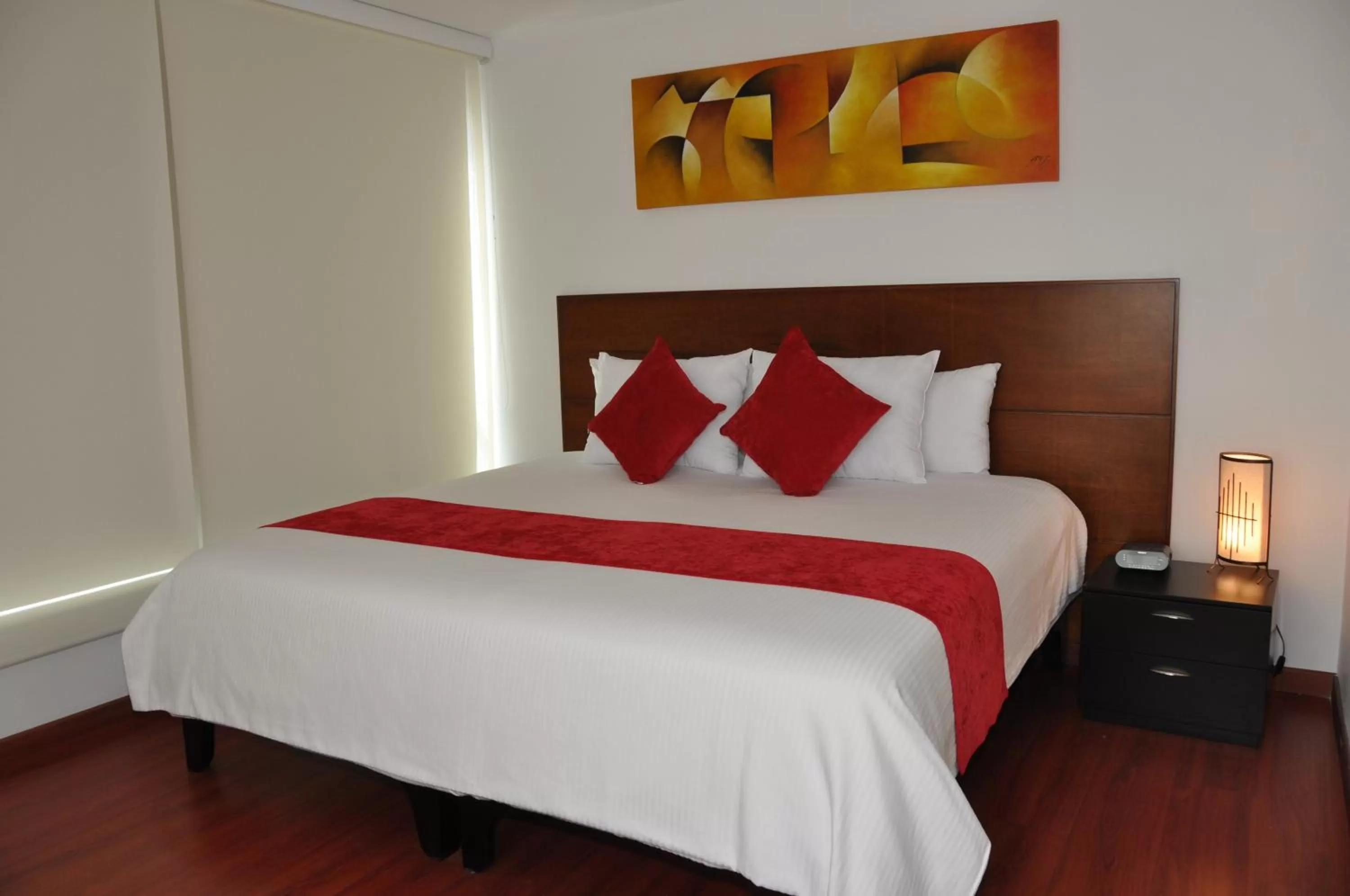 Bed in Apartasuites Plaza Modelia