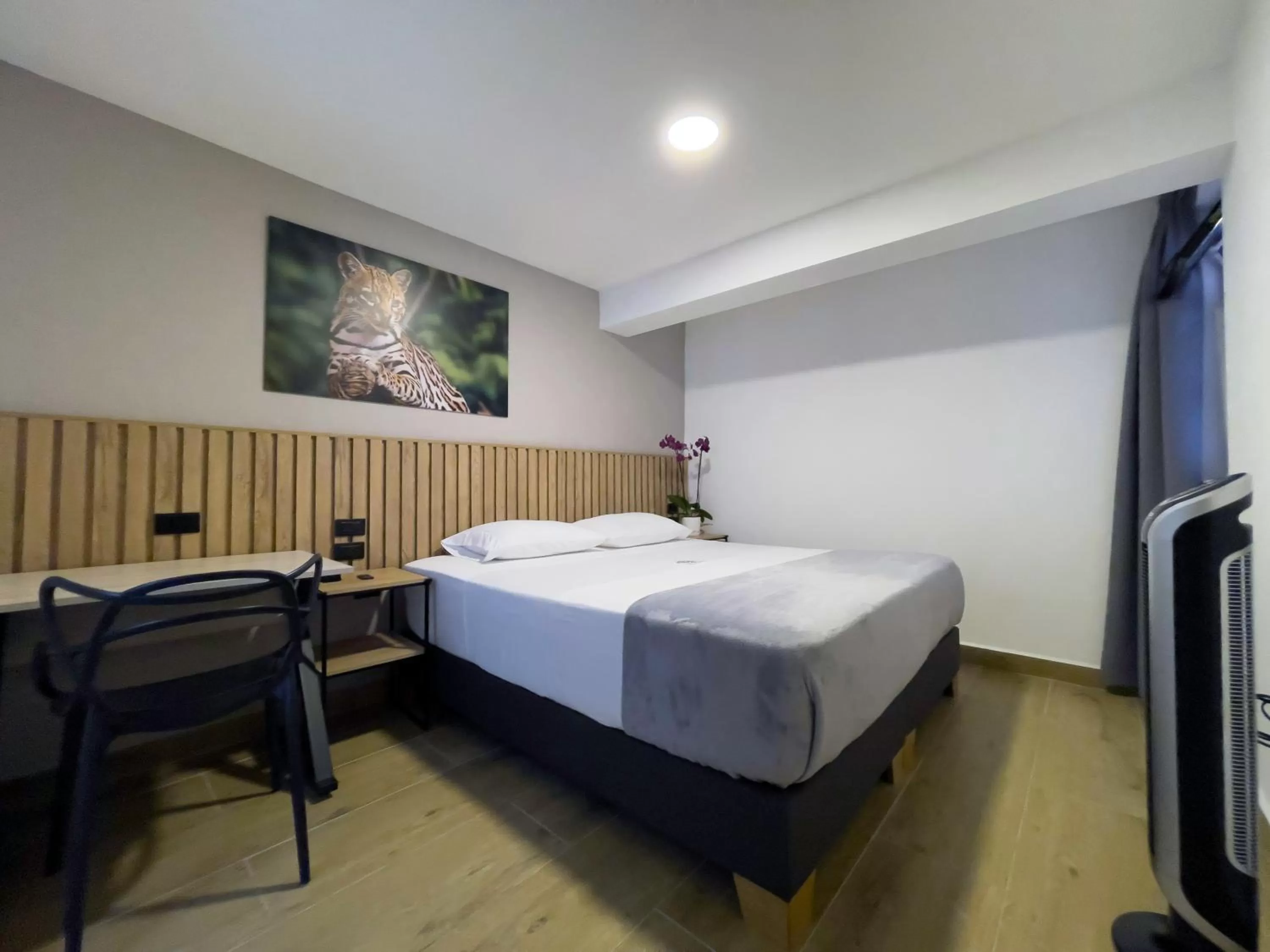 Bed in Vita Hotel Boutique