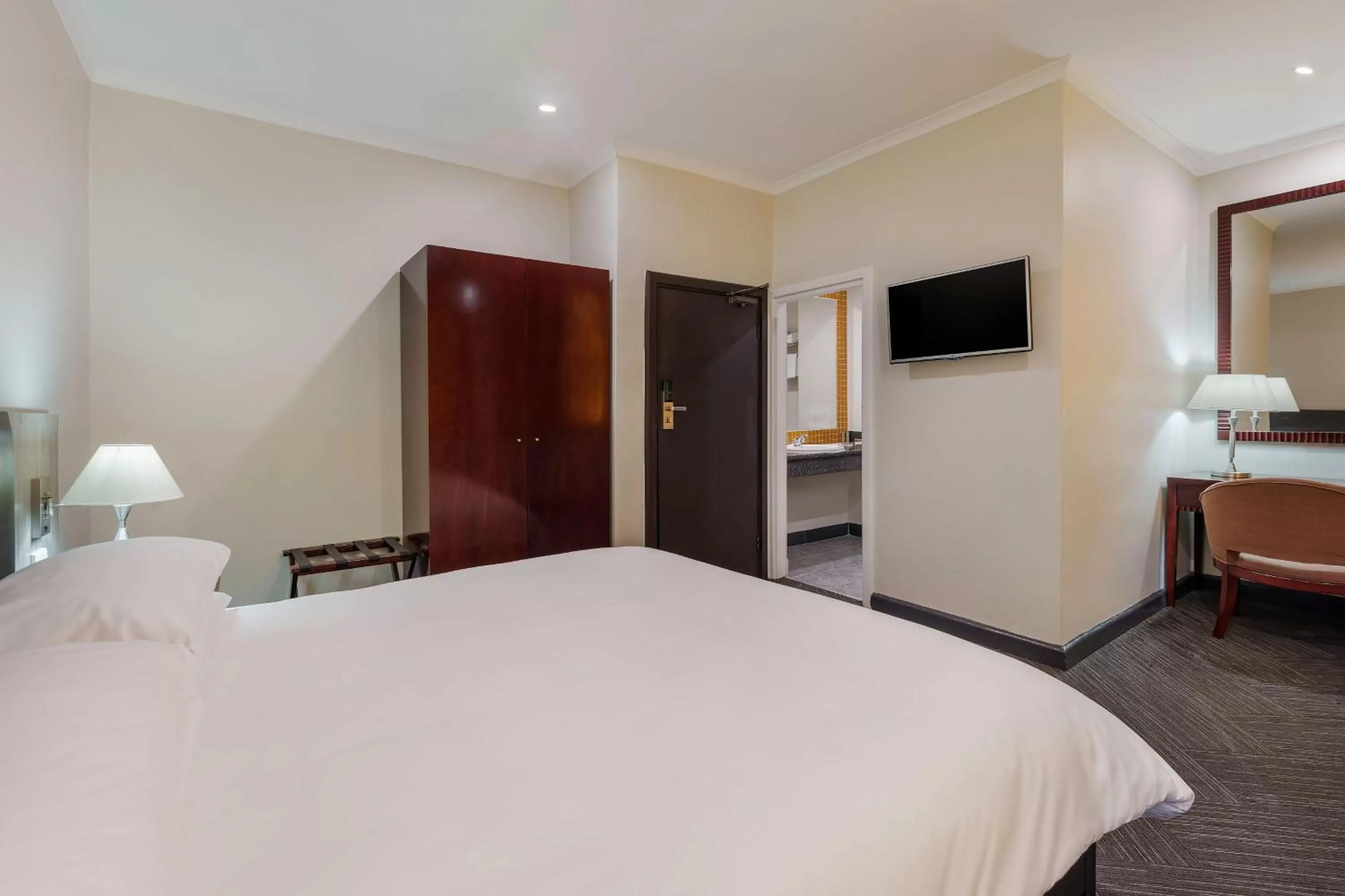 Photo of the whole room, Bed in Protea Hotel by Marriott Lusaka Cairo Road