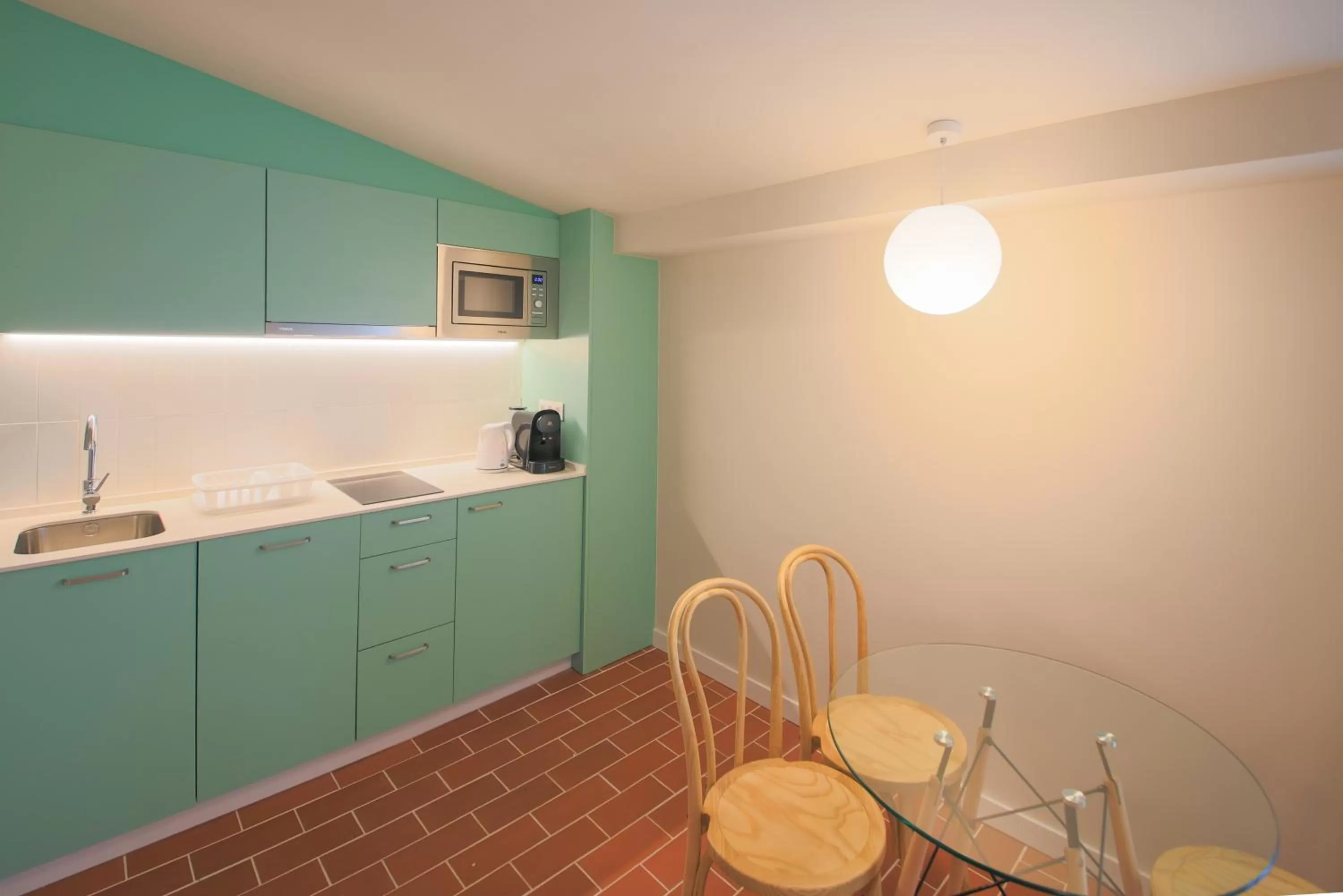 Kitchen or kitchenette in Terra Aurea Aparthotel