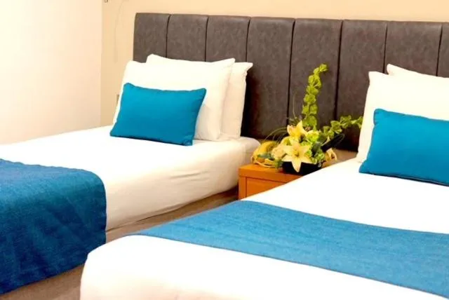 Bedroom in Queens Park Hotel