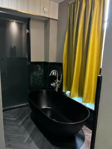 Bathroom in Triple G Hotels