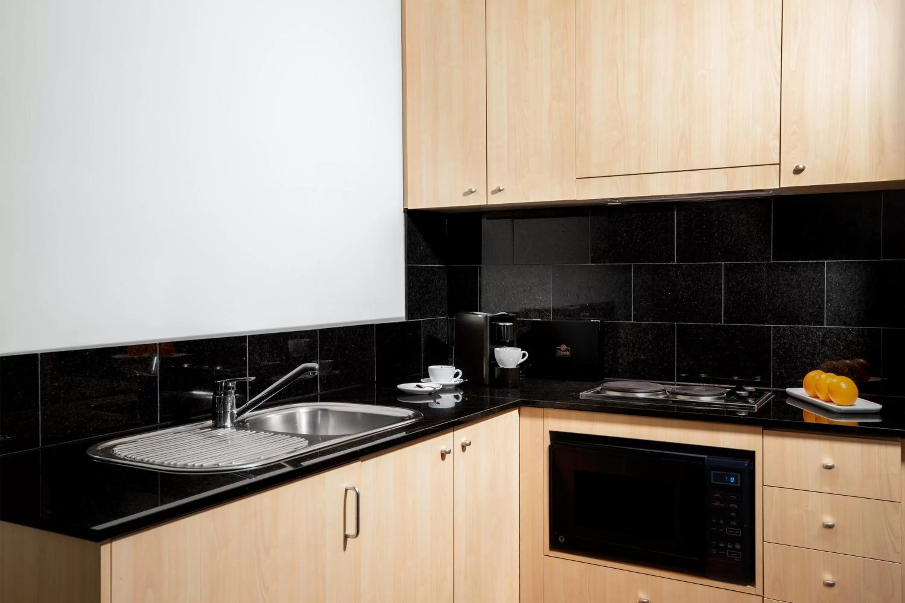 Kitchen or kitchenette in Mantra on Little Bourke Melbourne