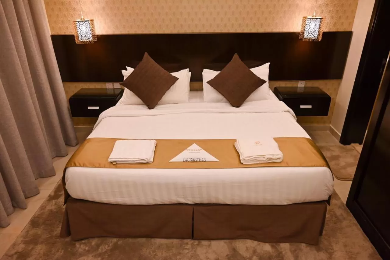 Bed in The Artisan Hotel-Suits