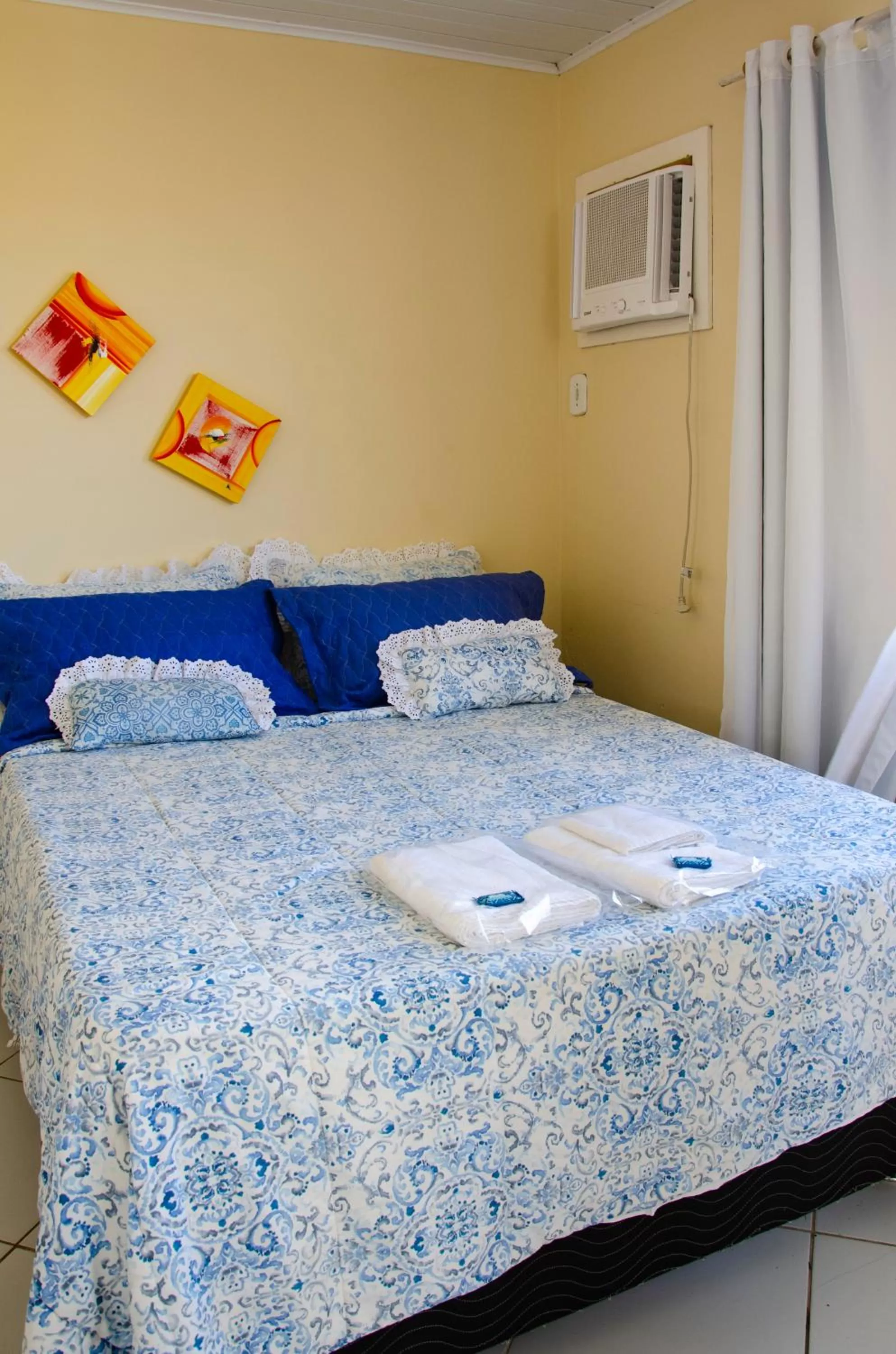 Bed in Pousada Luzes de Geribá