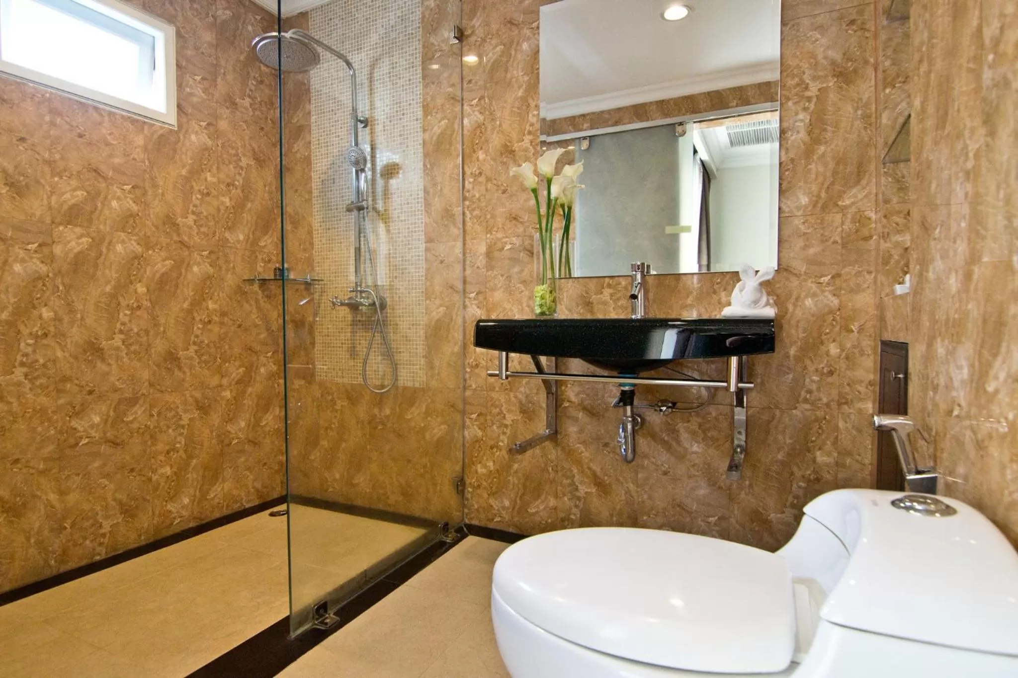 Bathroom in LK Mantra Pura Resort