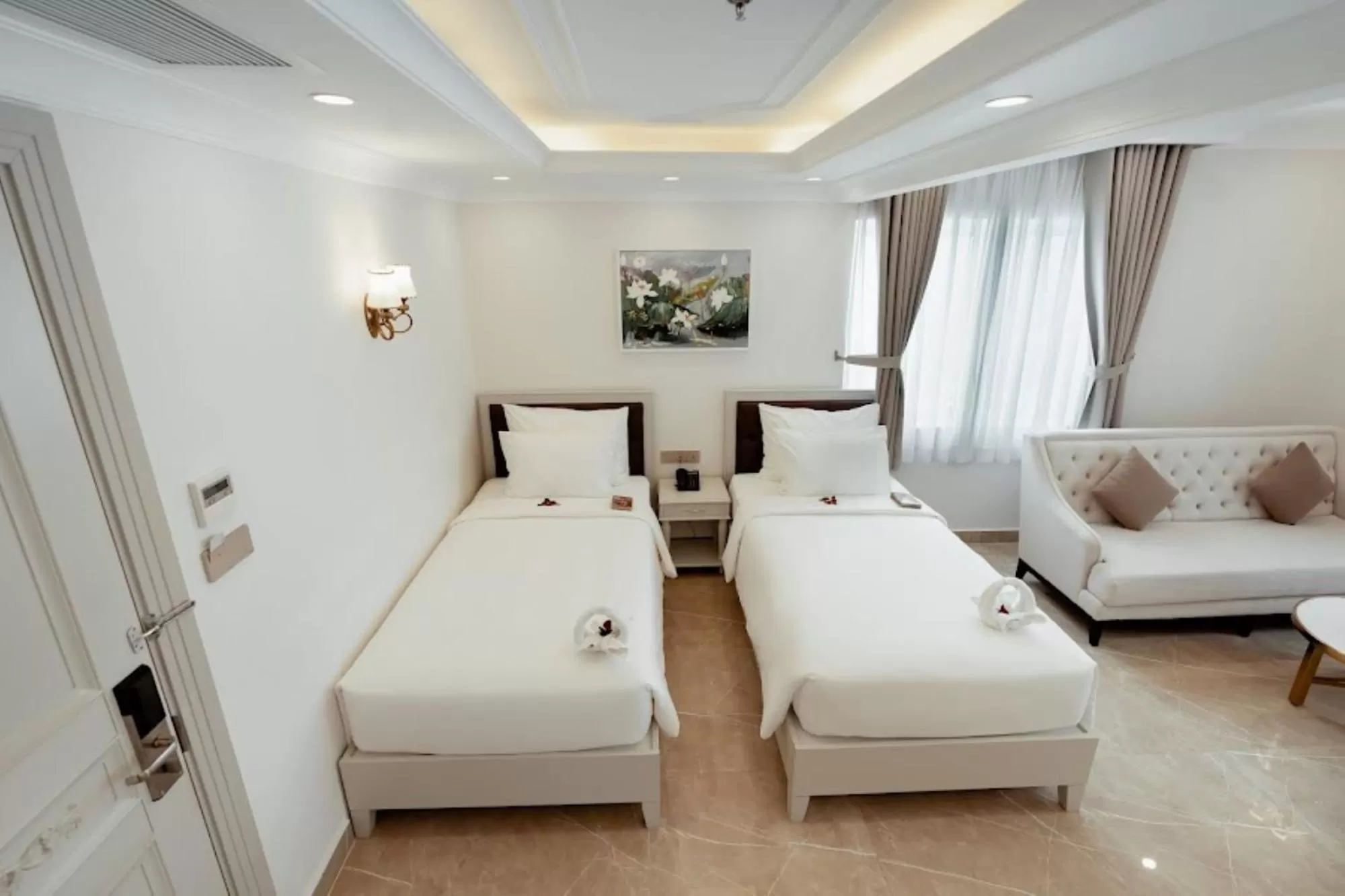 Photo of the whole room, Bed in MerPerle Beach Hotel