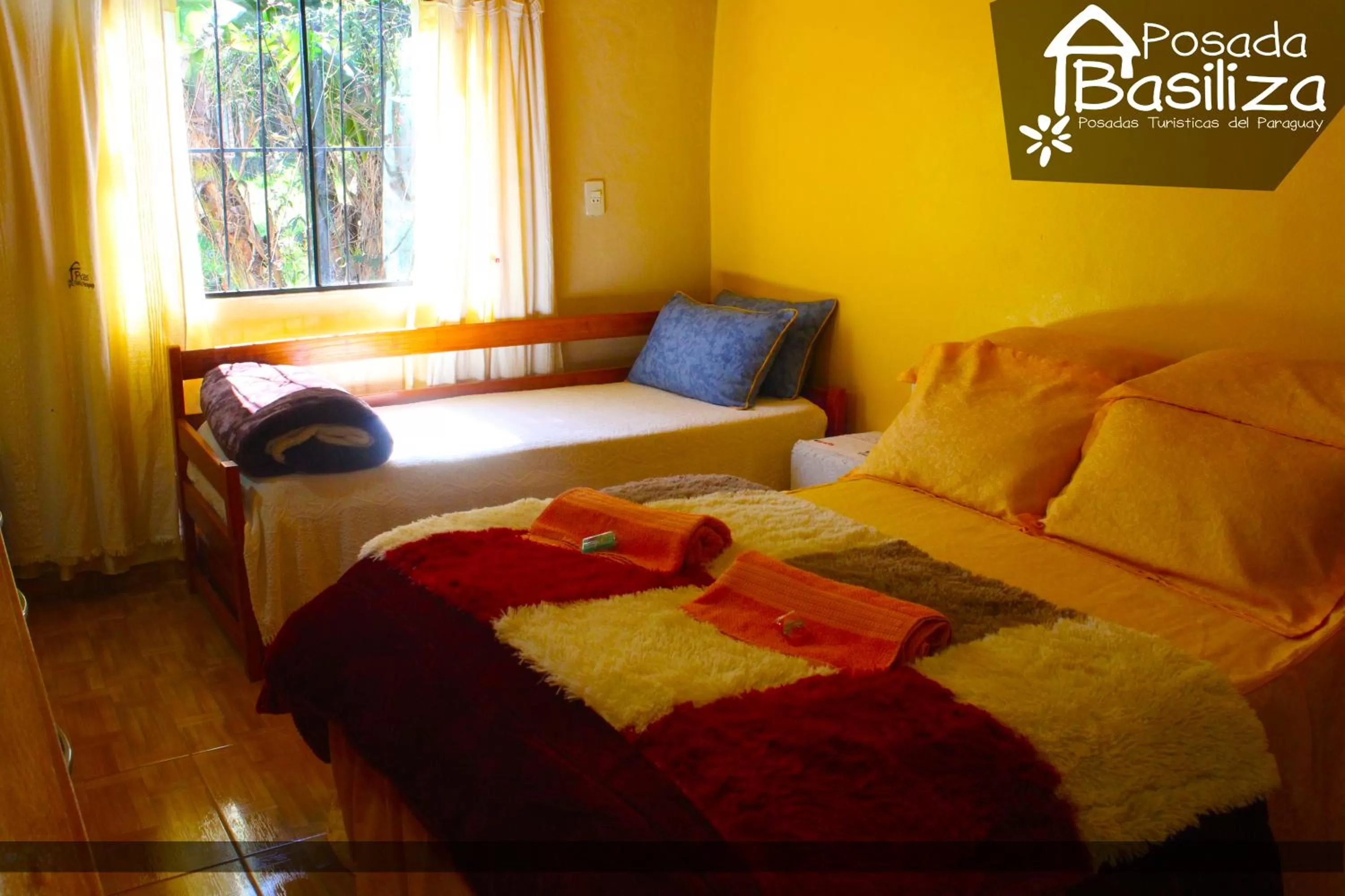 Photo of the whole room, Bed in Posada Basiliza, Encarnación PY