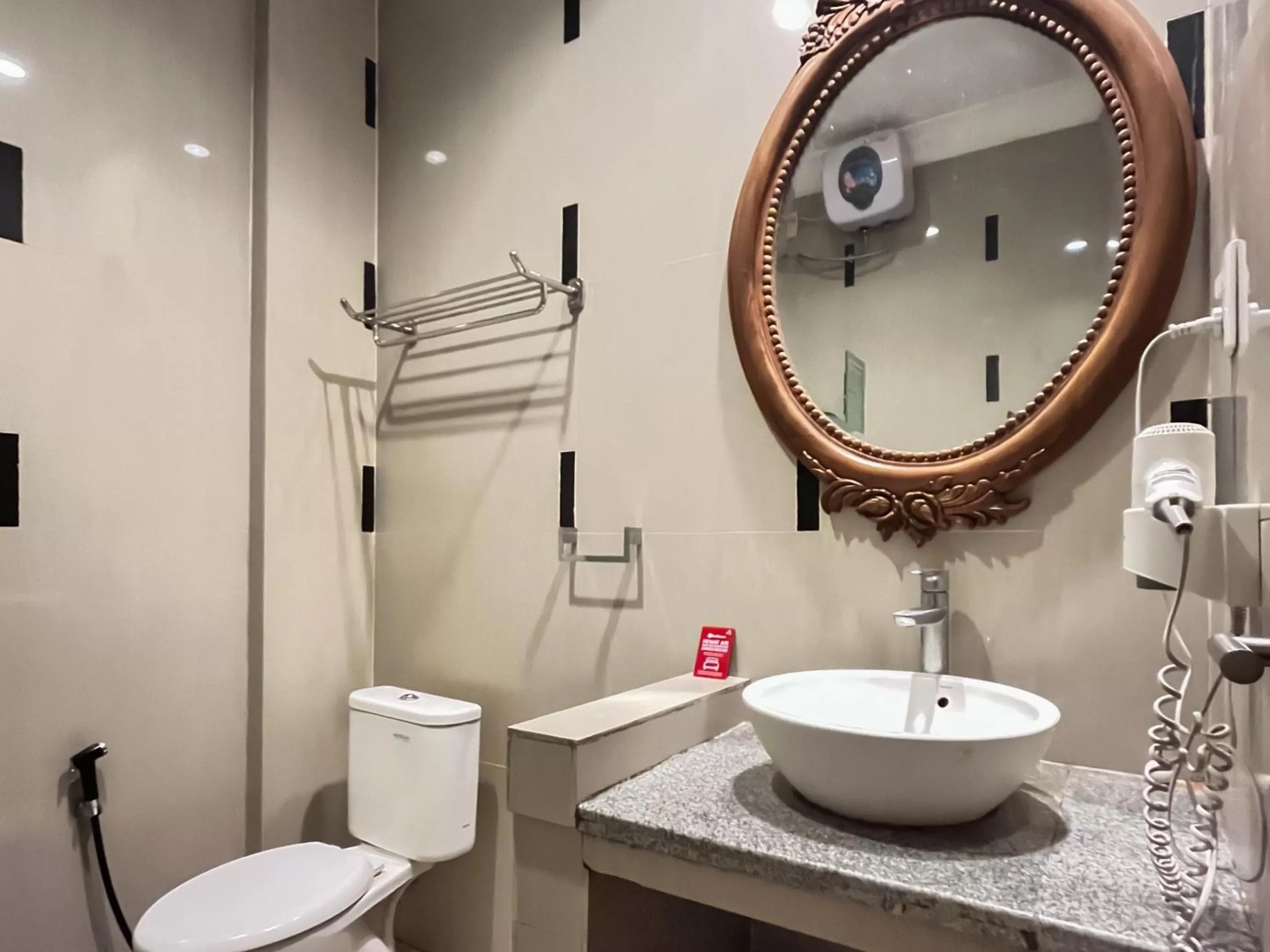 Bathroom in RedDoorz Premium Syariah at Mutiara Hijau Suites Medan