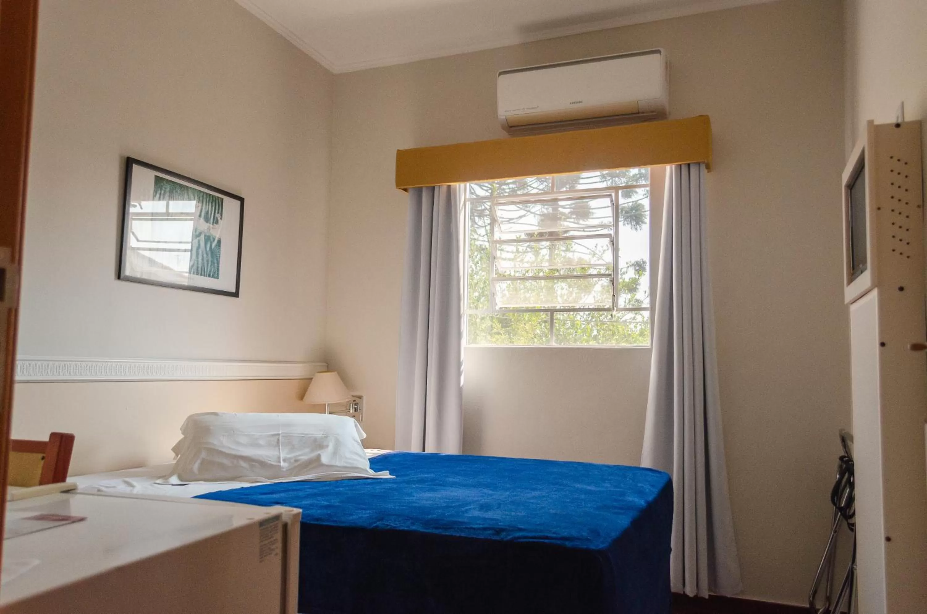 Bed in Central Palace Hotel