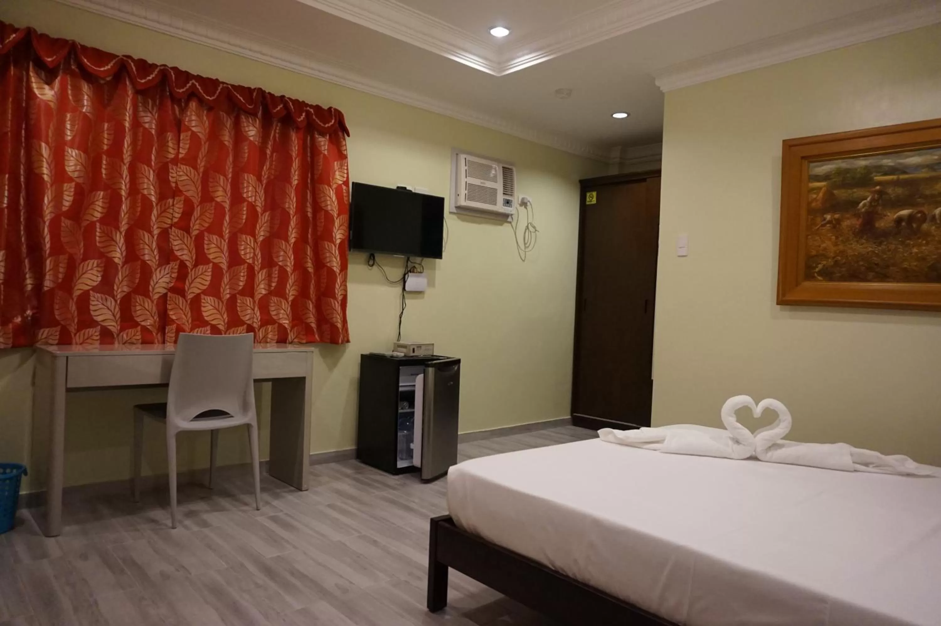 Bed in Wellbeach Dive Resort