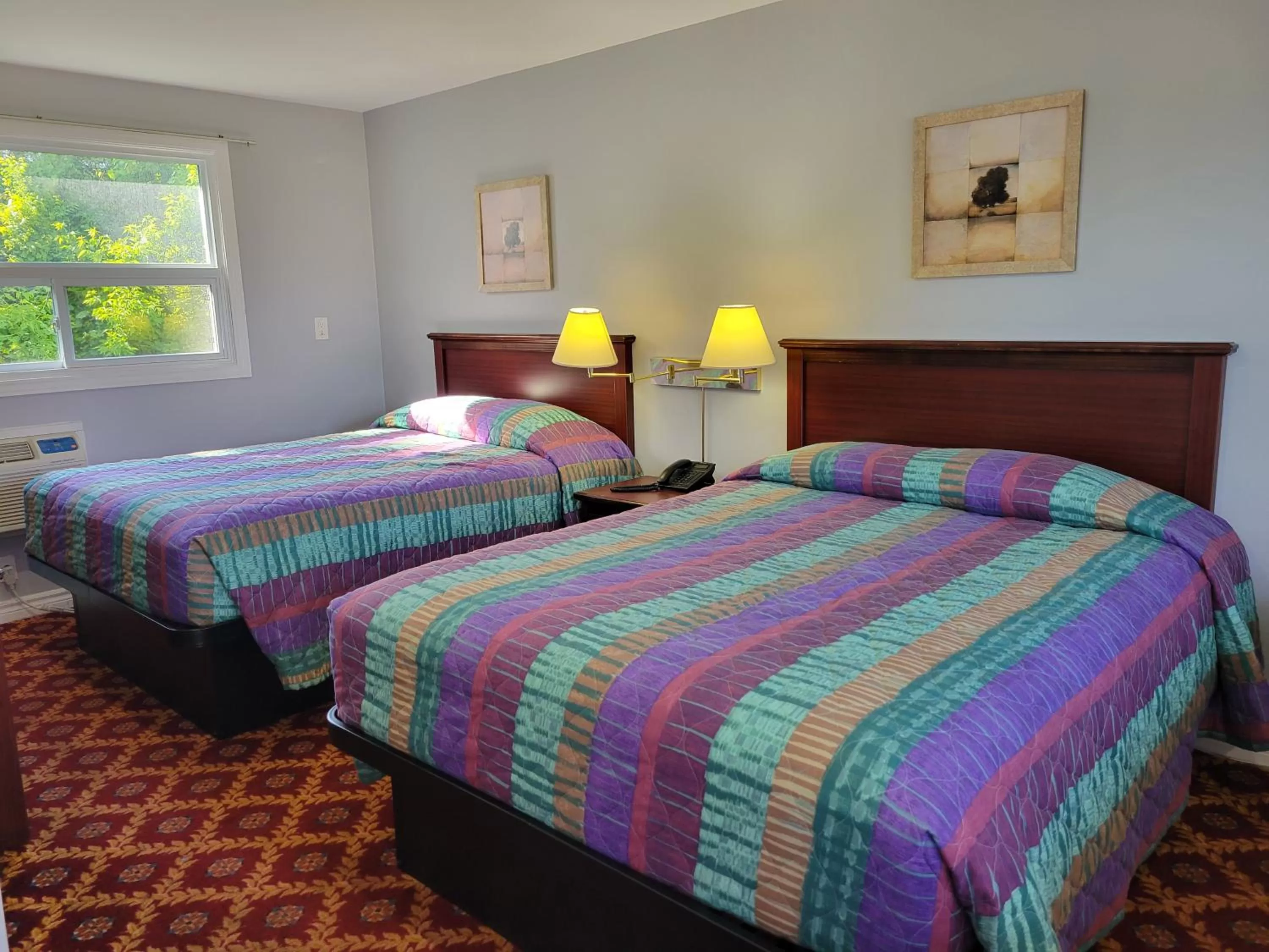 Bed in Knights Inn Cobourg