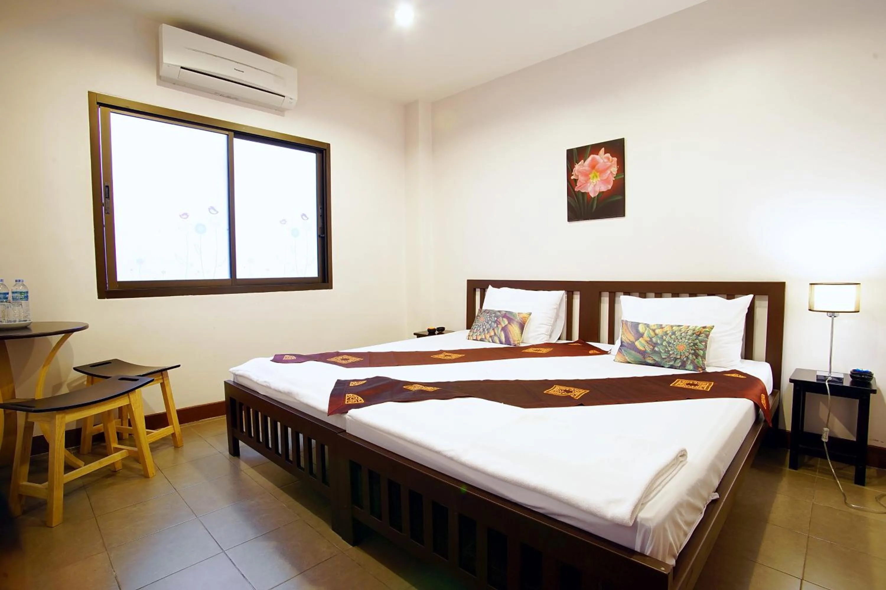 Decorative detail, Bed in Ming Shou Boutique House