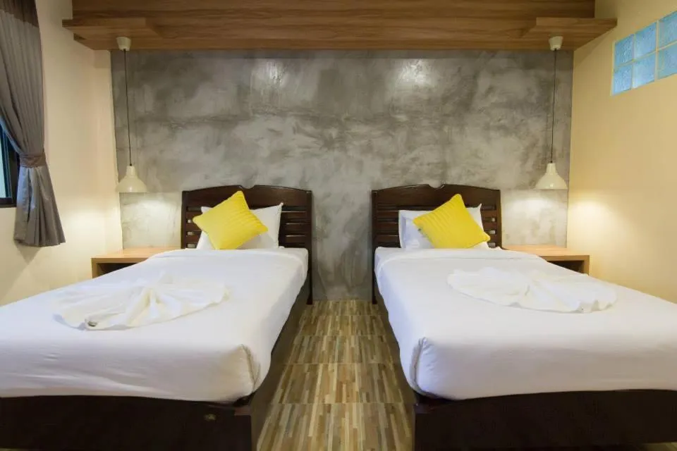 Bed in K.L. Boutique Hotel