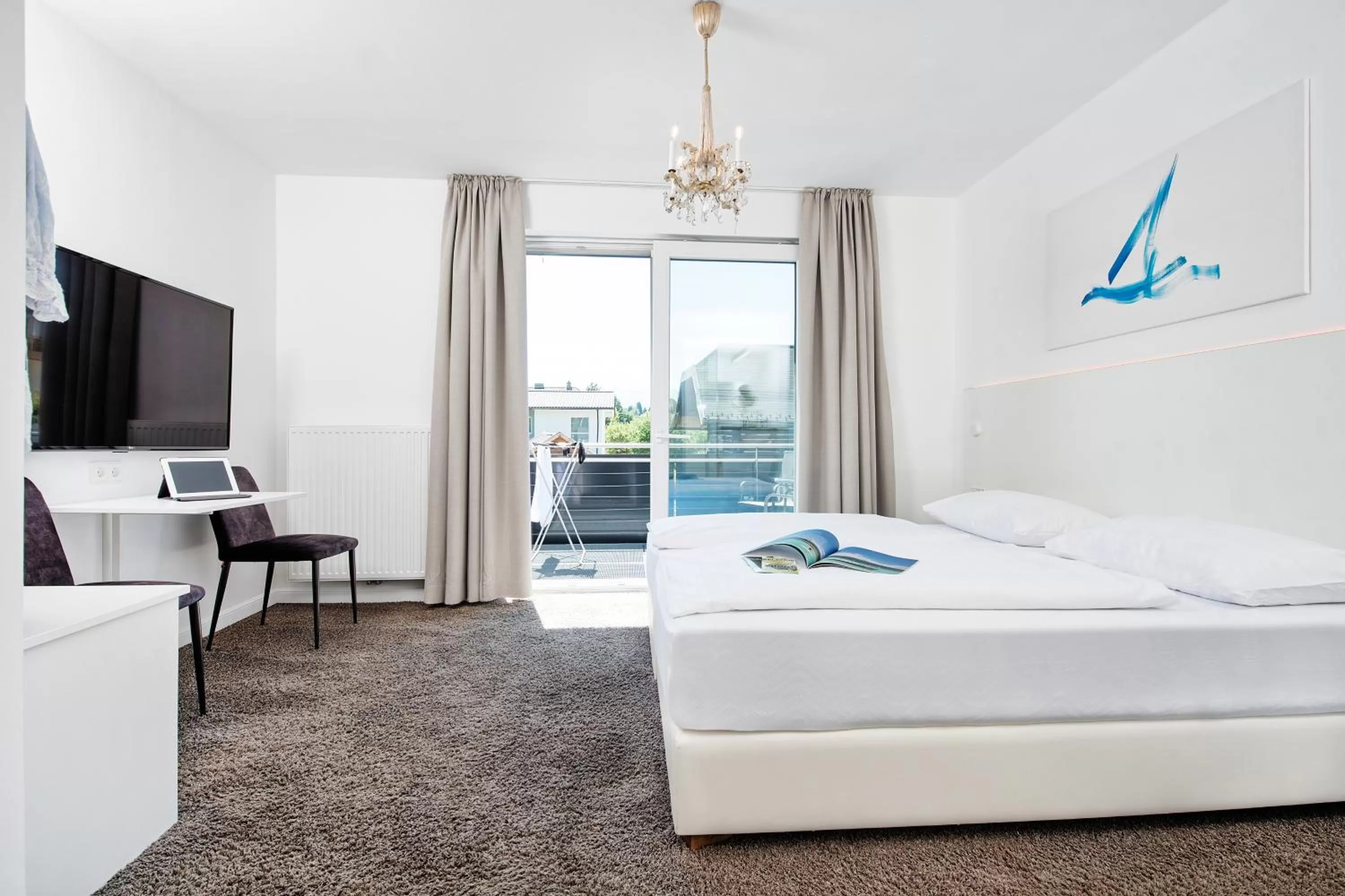 Photo of the whole room in Hotel 24 Checkin Velden