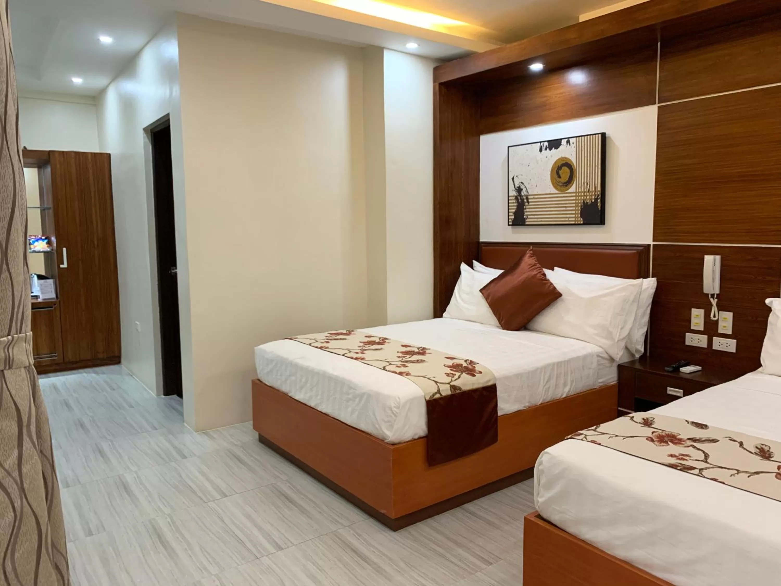 Bed in Rustic Crown Hotel