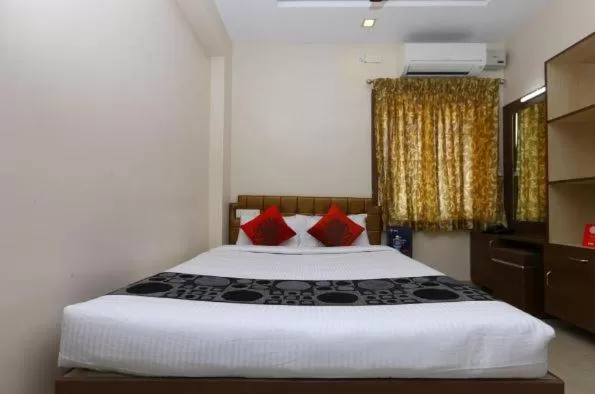 Bed in Sri Kamadhenu Residency