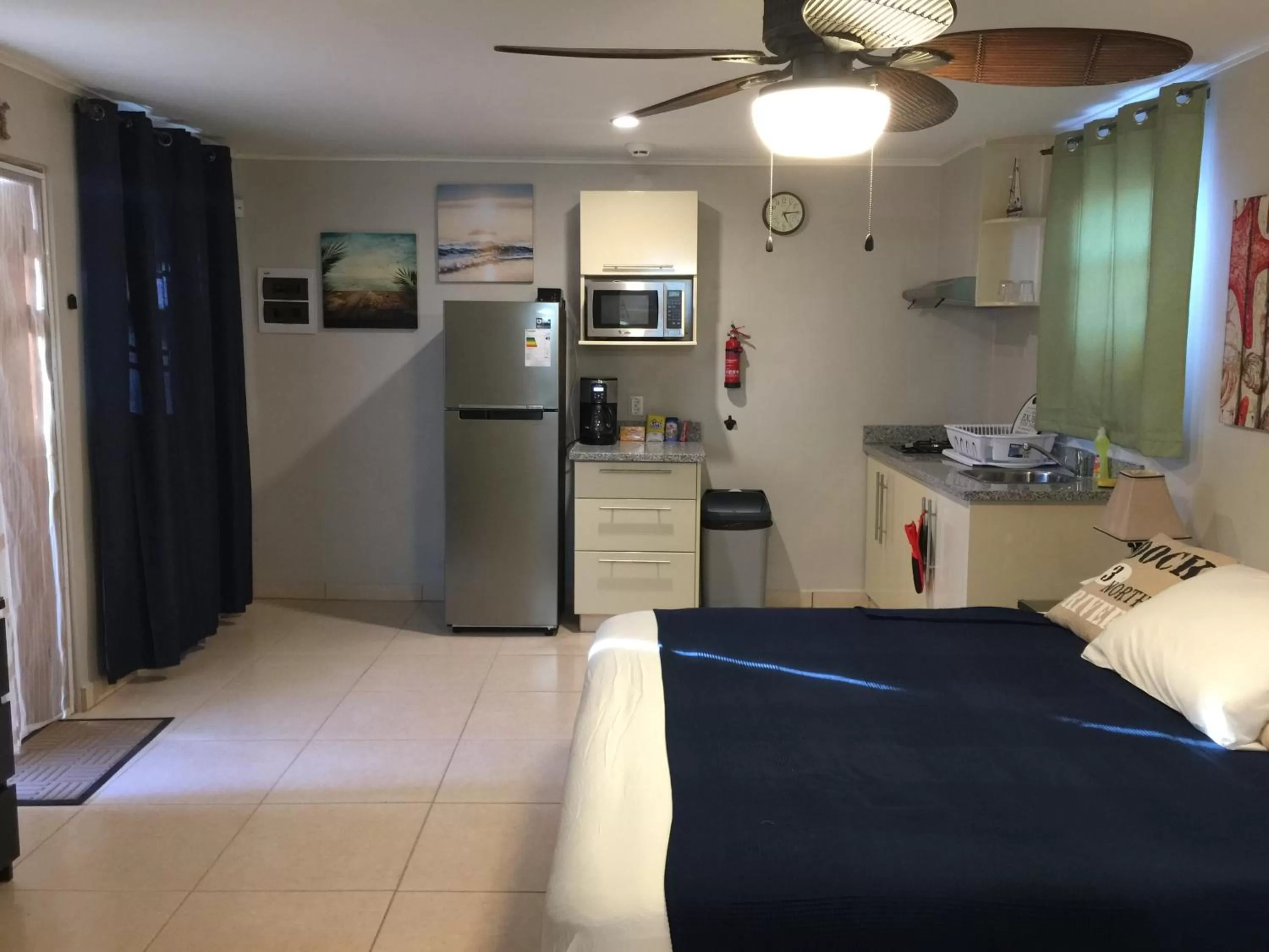 Bed in The Pier Beach Inn & Suites