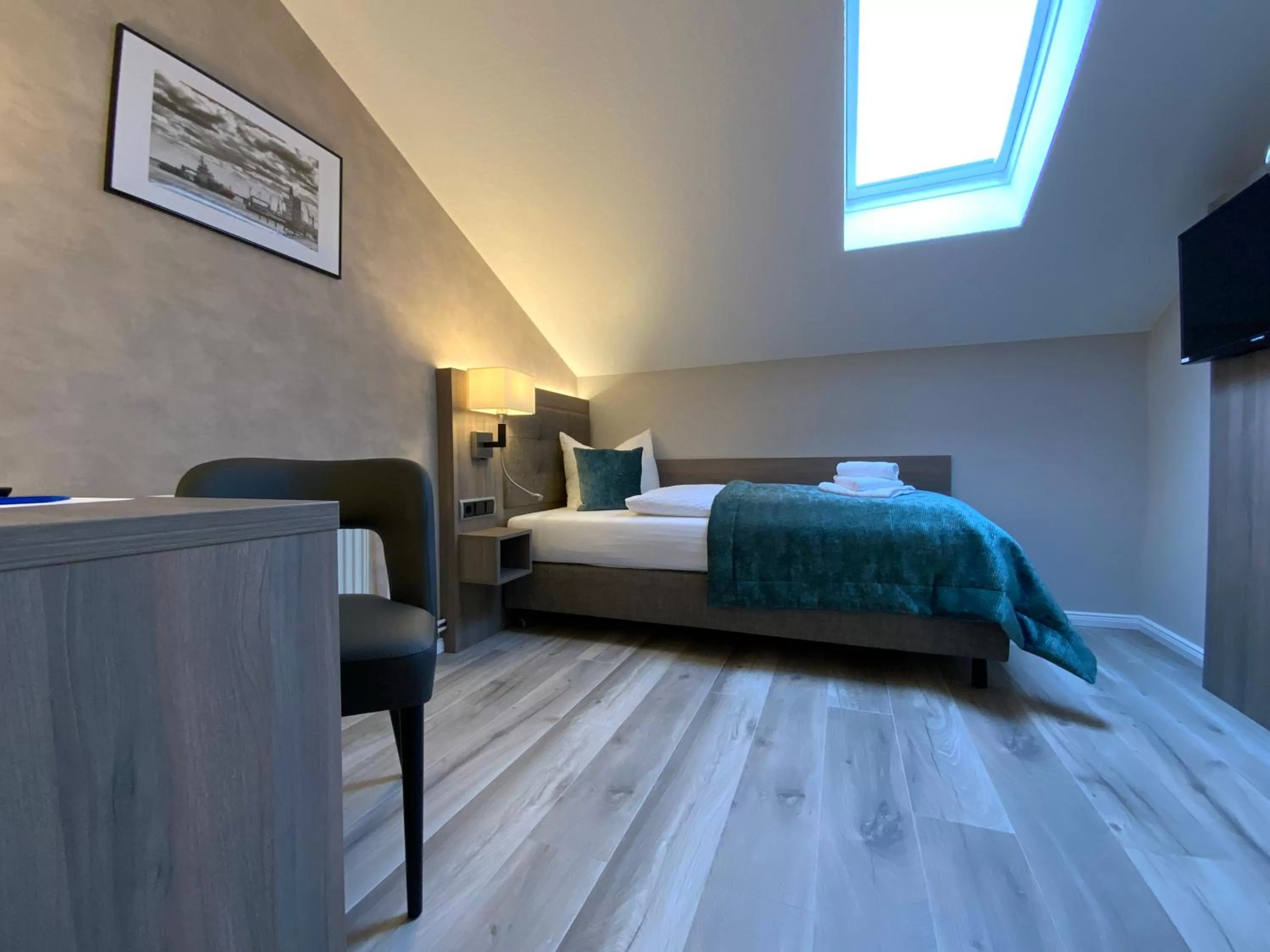 Photo of the whole room, Bed in Mertinkus Nordseehotel