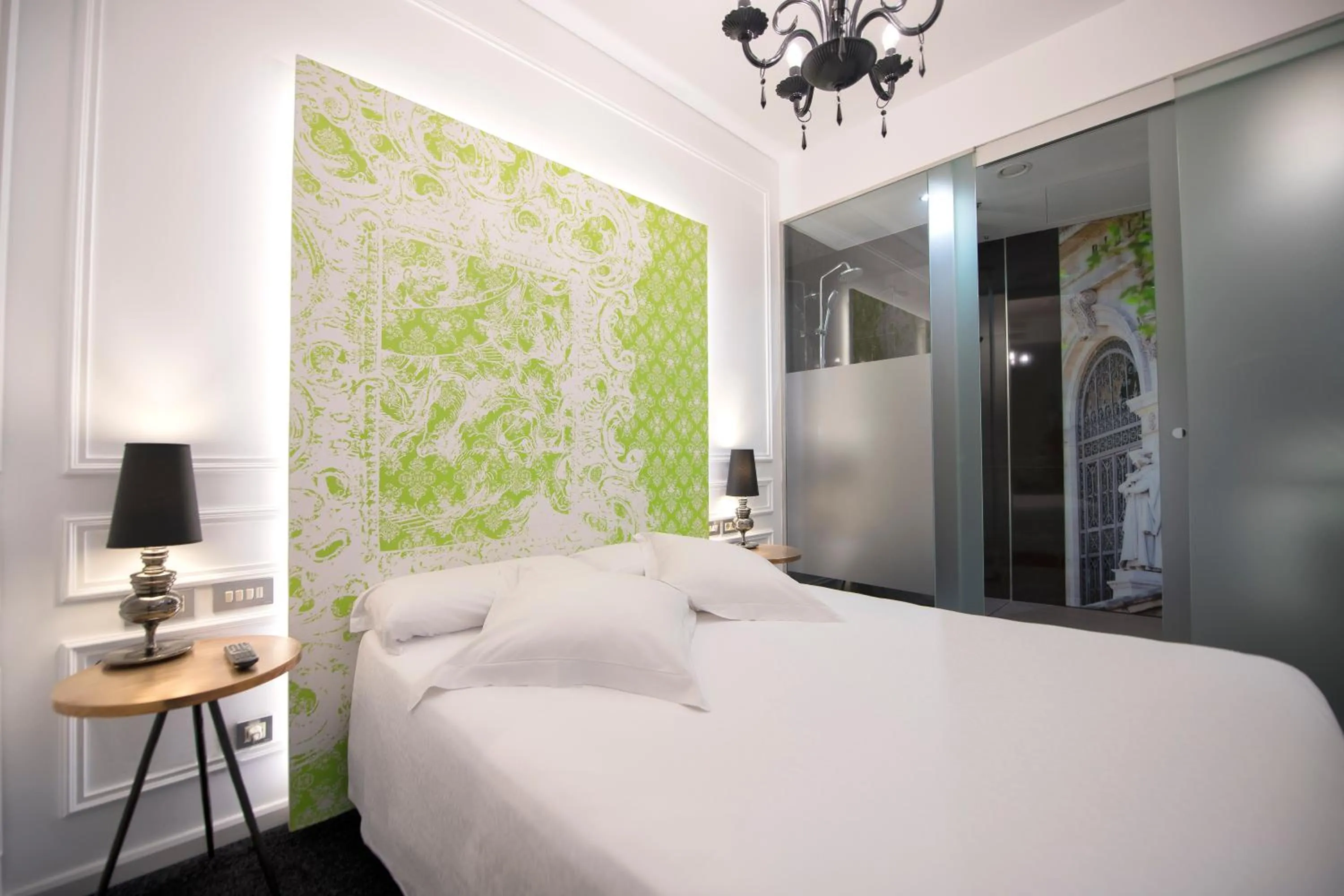 Bed in Posada del Dragón Boutique Hotel