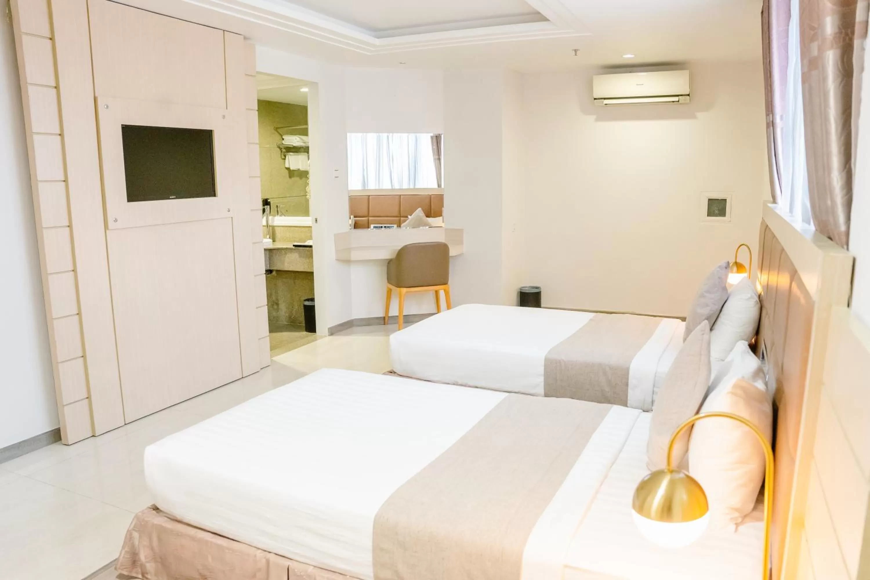 Bed in Holiday One Can Tho Hotel