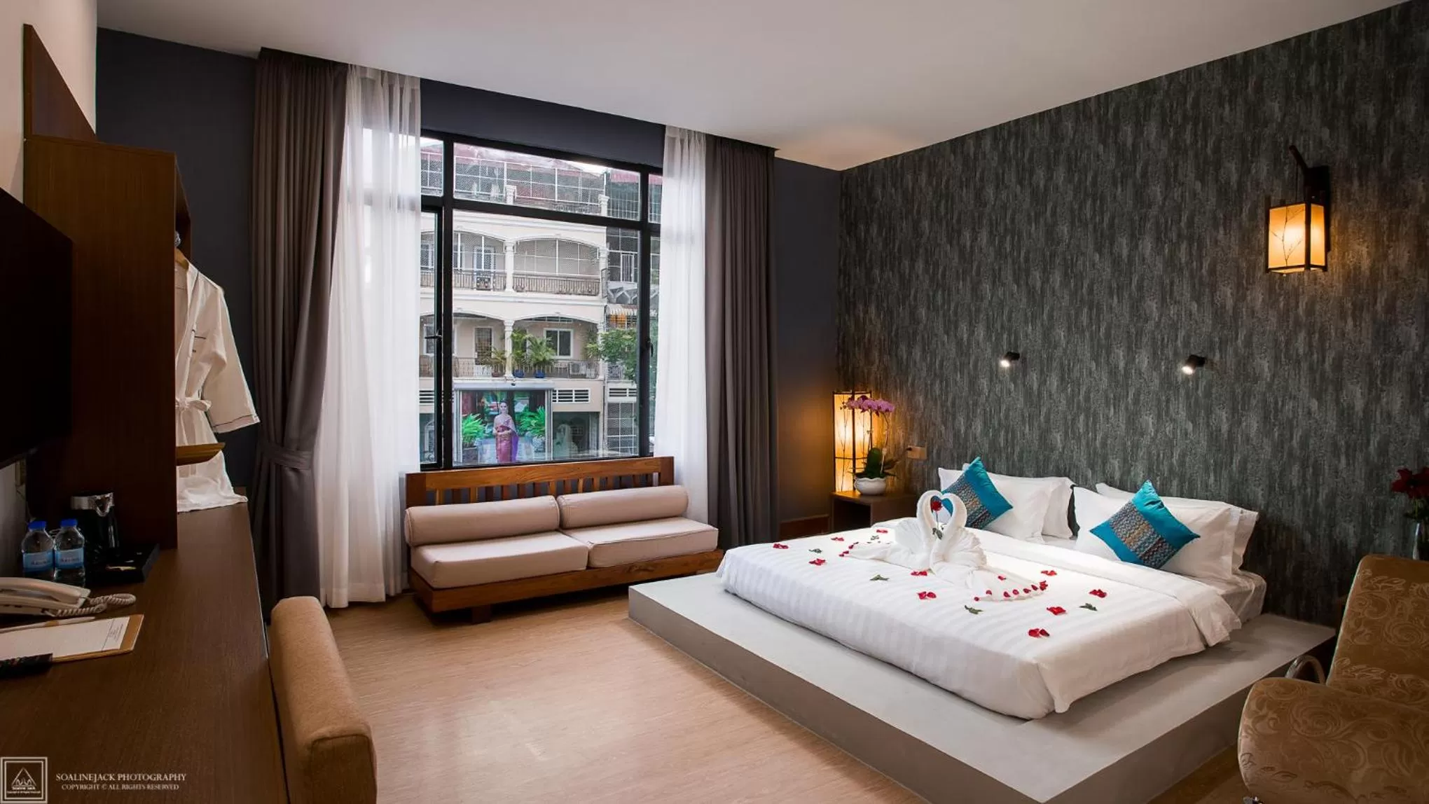 Photo of the whole room, Bed in Orussey One Boutique