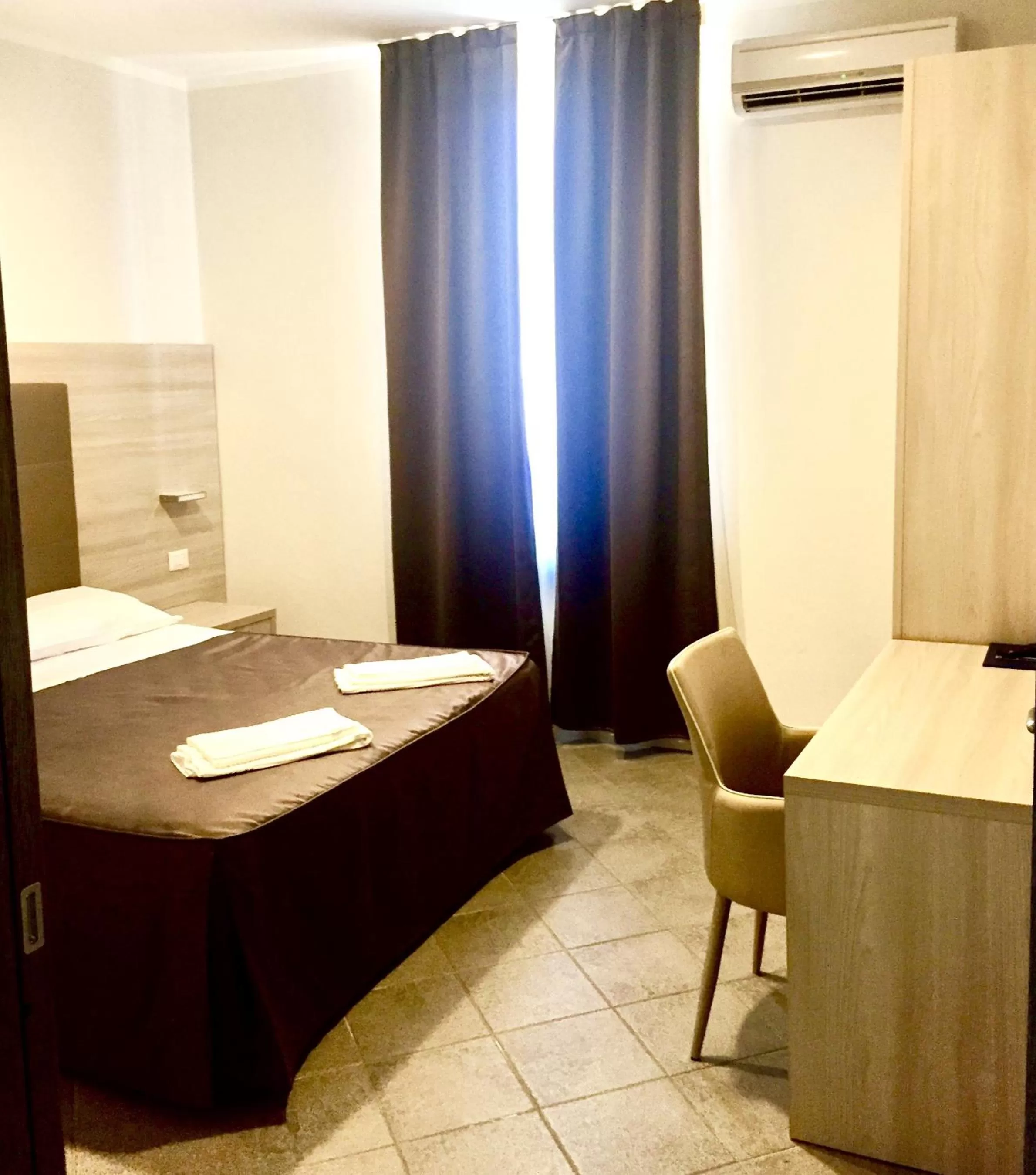 Bedroom in Academy Hotel