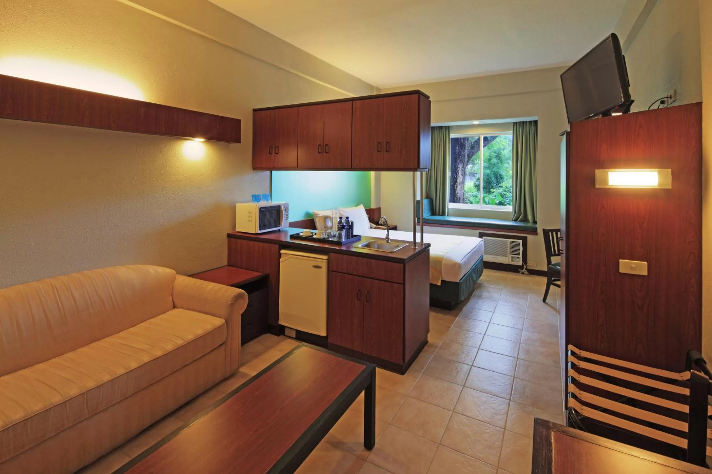 Photo of the whole room in Microtel by Wyndham Tarlac
