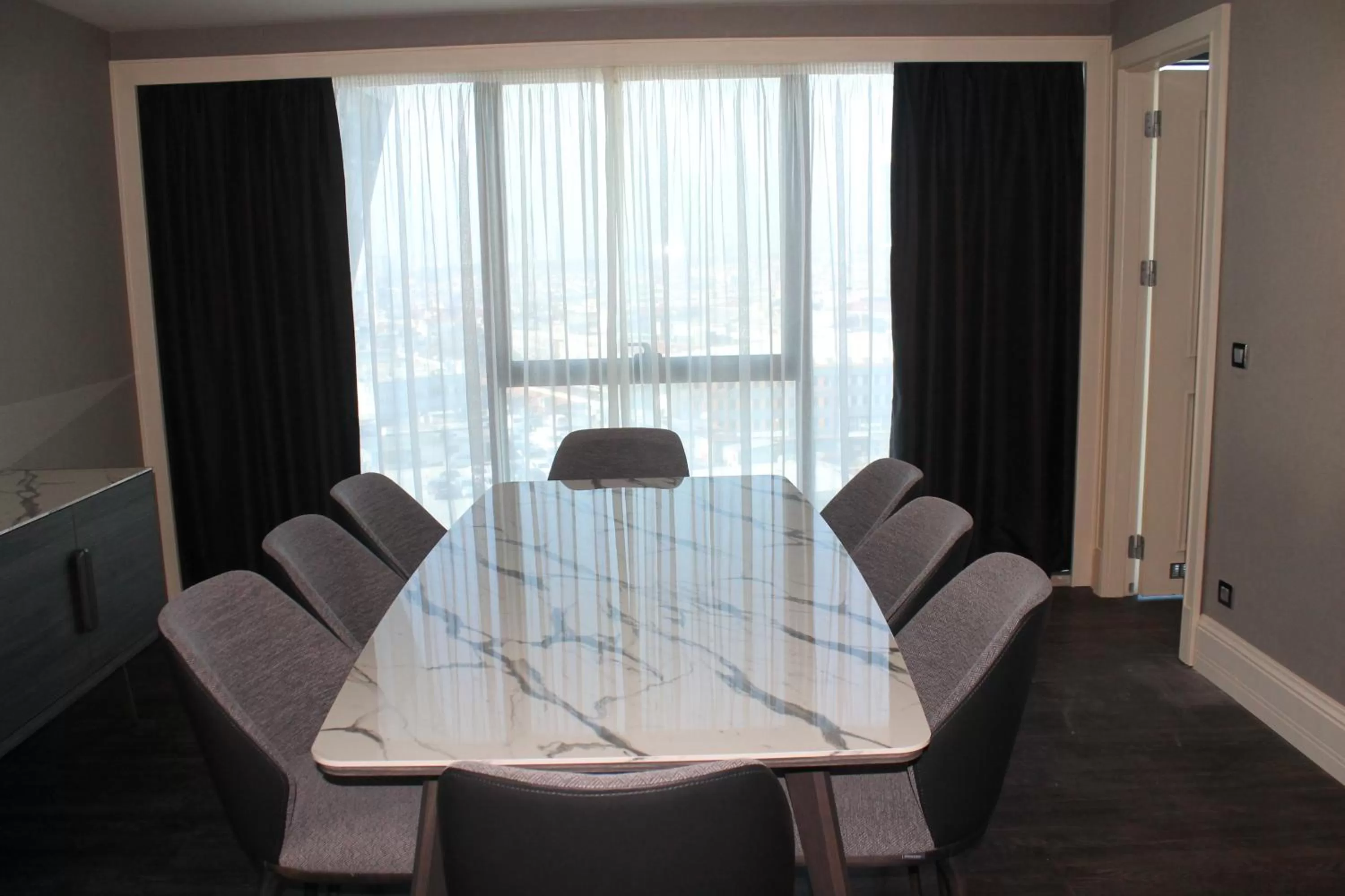 Living room, Dining Area in Windsor Hotel & Convention Center Istanbul