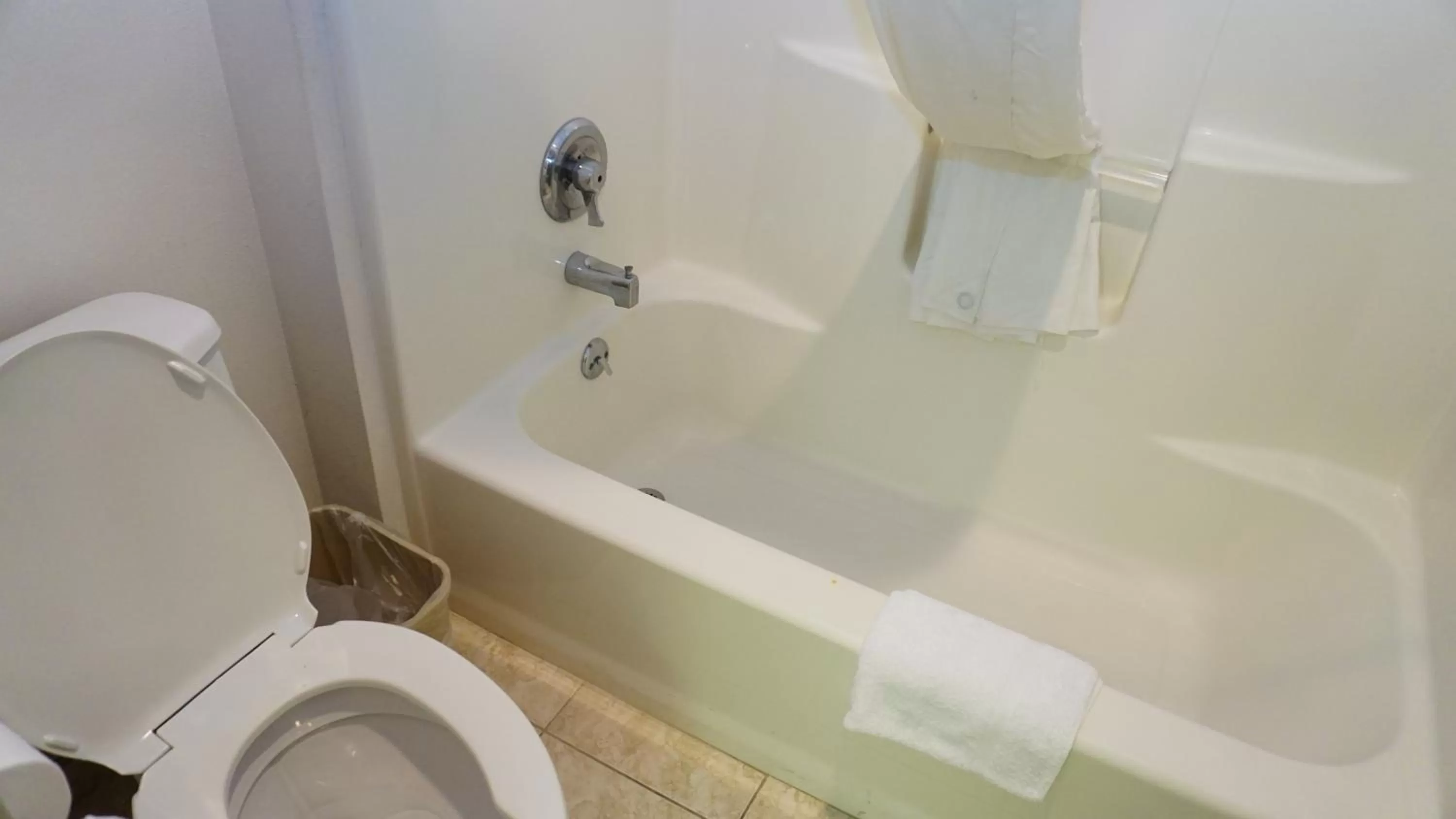 Bathroom in Baymont by Wyndham Arlington At Six Flags Dr