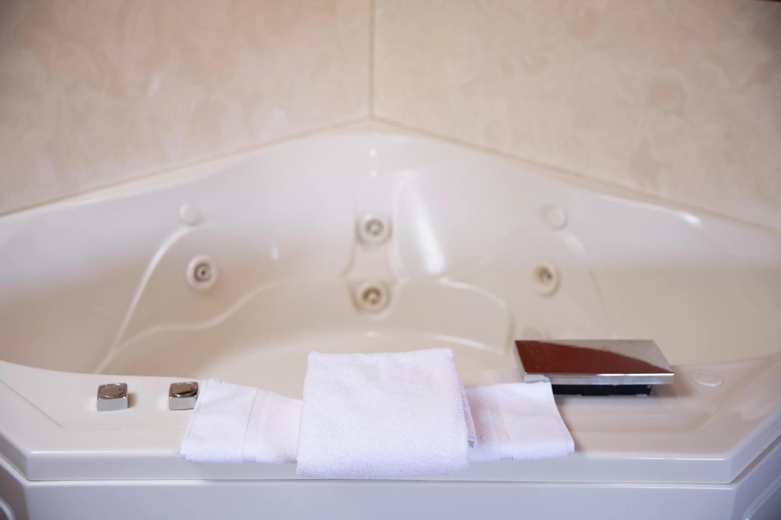 Bathroom in AmericInn by Wyndham Pampa Event Center