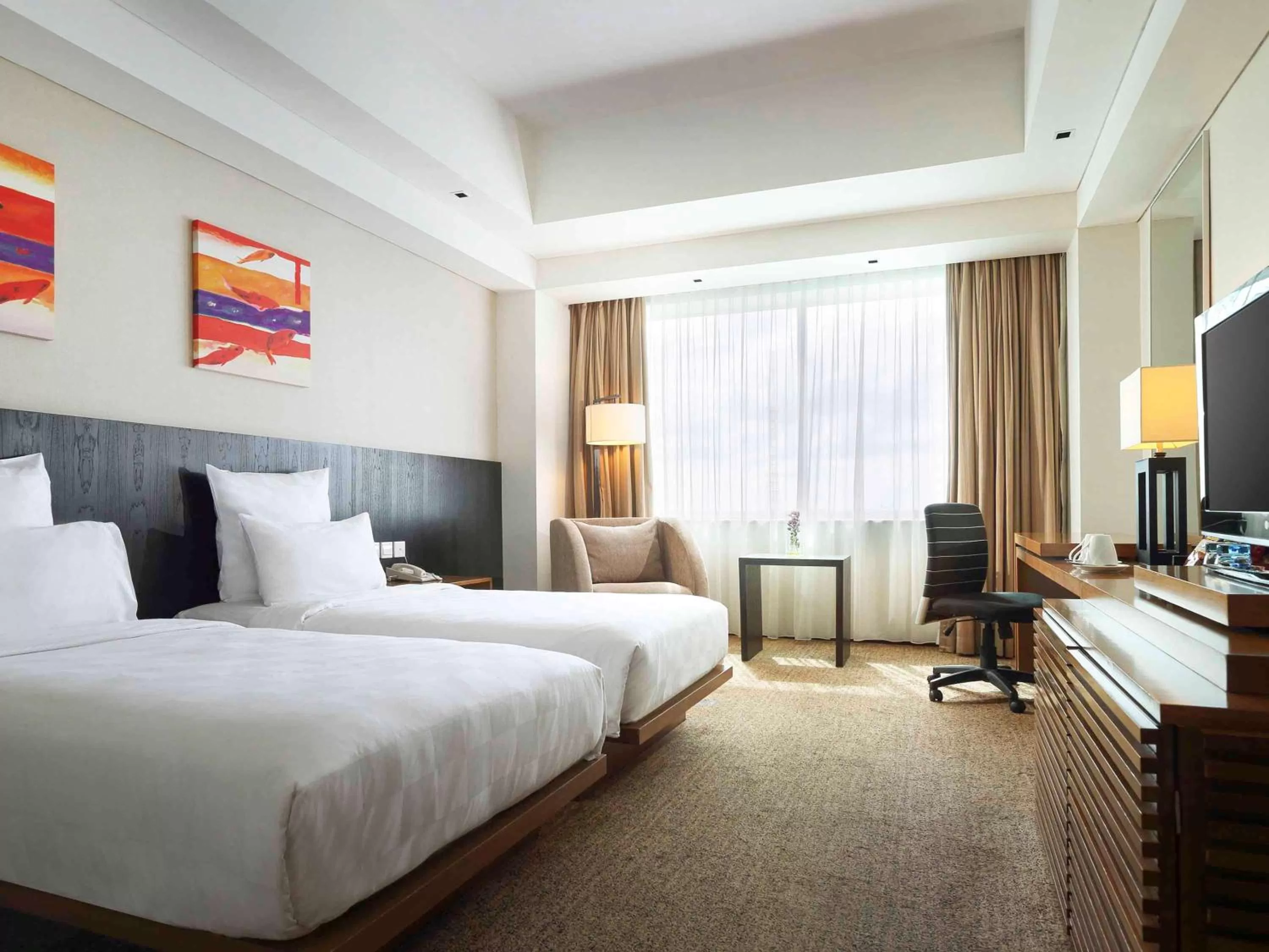 Photo of the whole room, Bed in Novotel Balikpapan