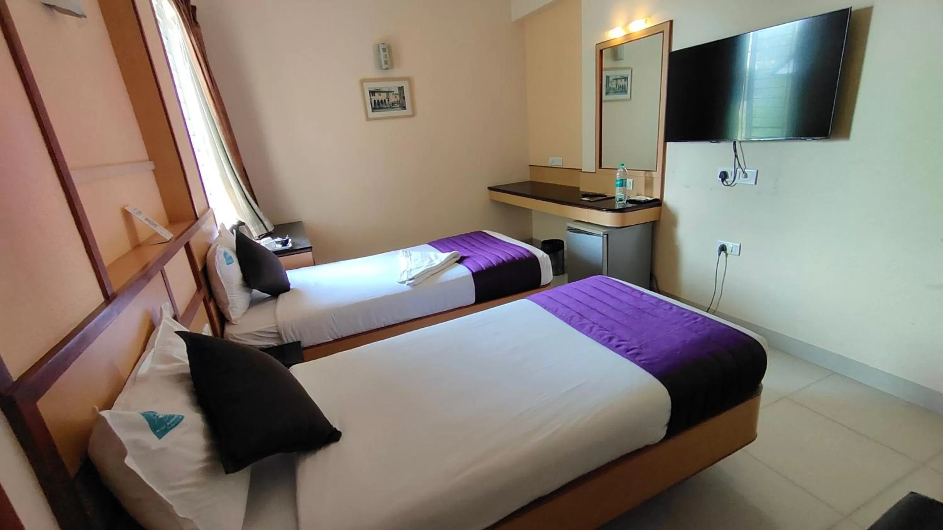 Bed in Hotel Aishwarywaa