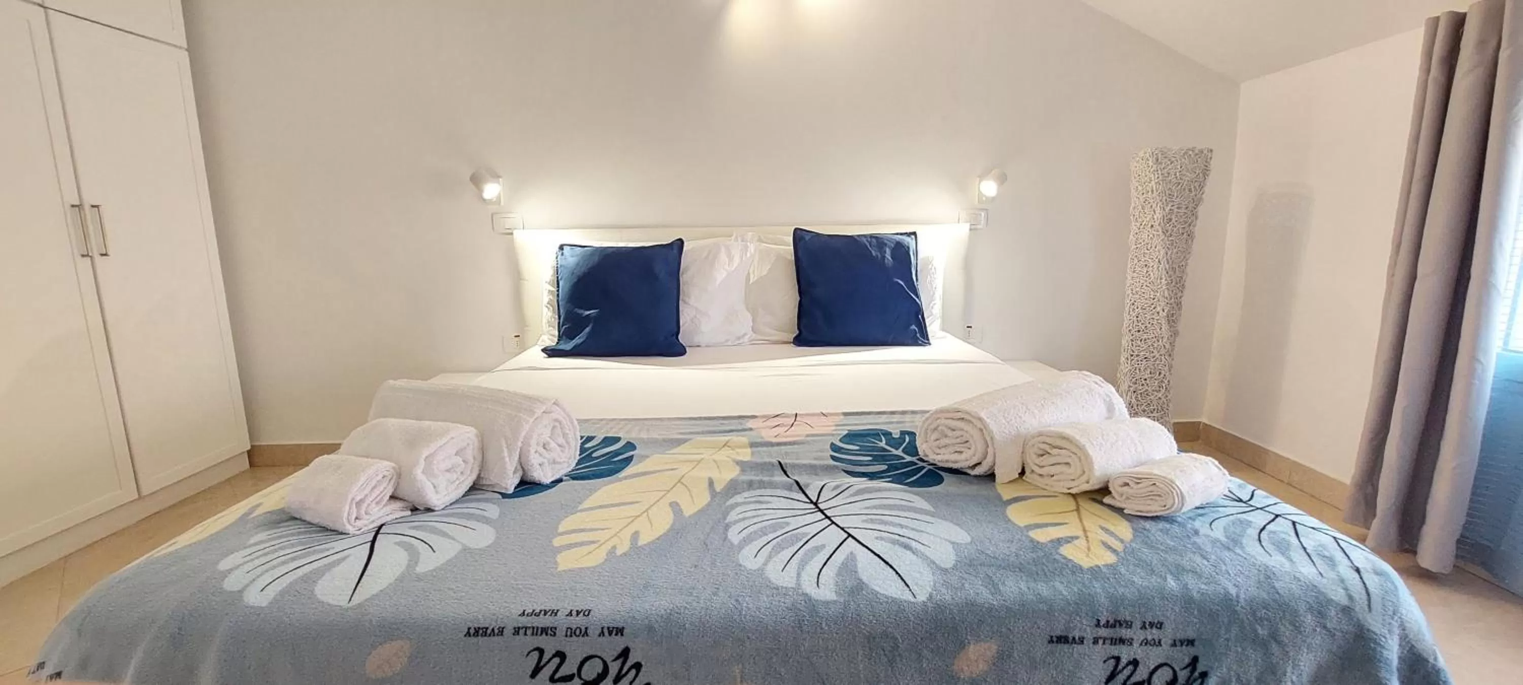 Bed in Branco Suites - Rooms & Holiday Apartments