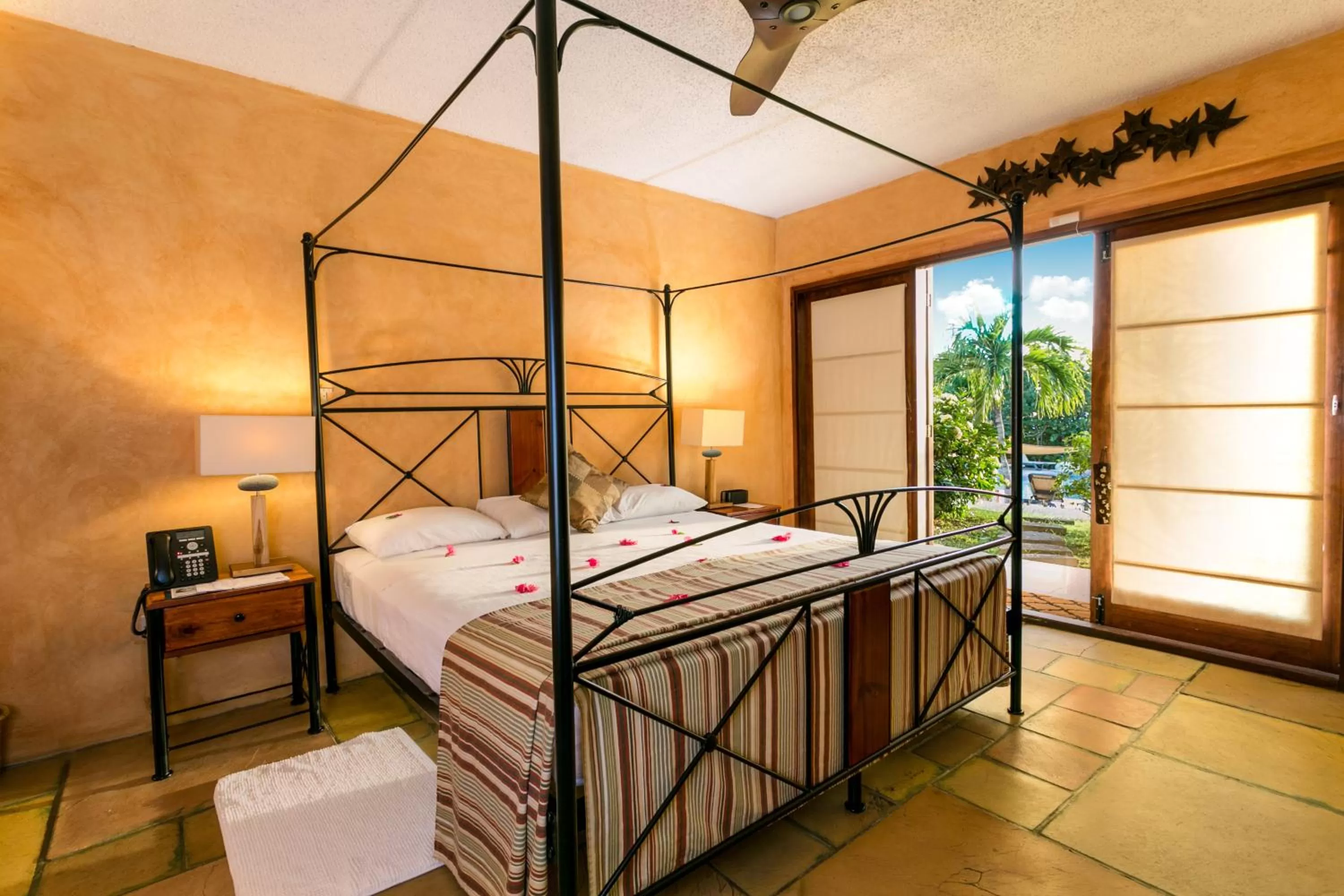 Bed in True Blue Bay Resort