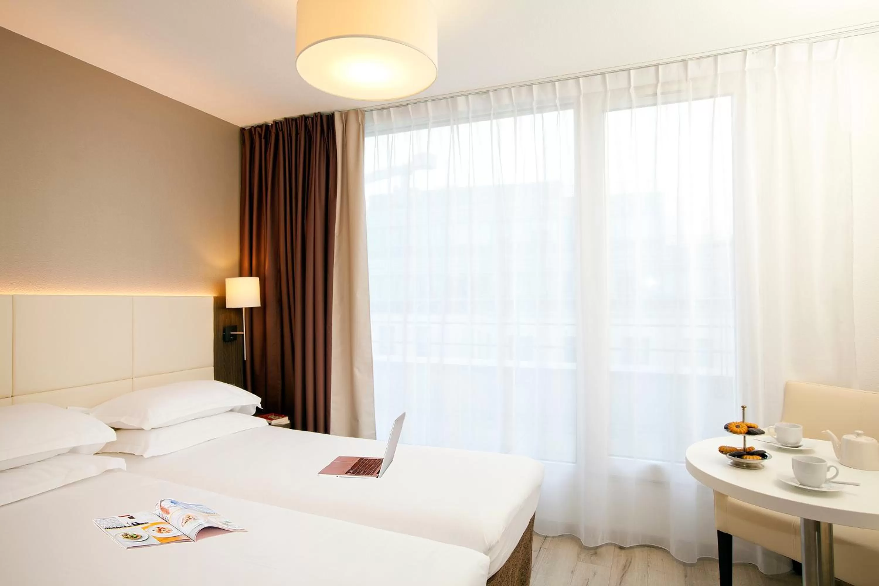 Bedroom, Bed in Séjours & Affaires Montreuil Saint Mandé