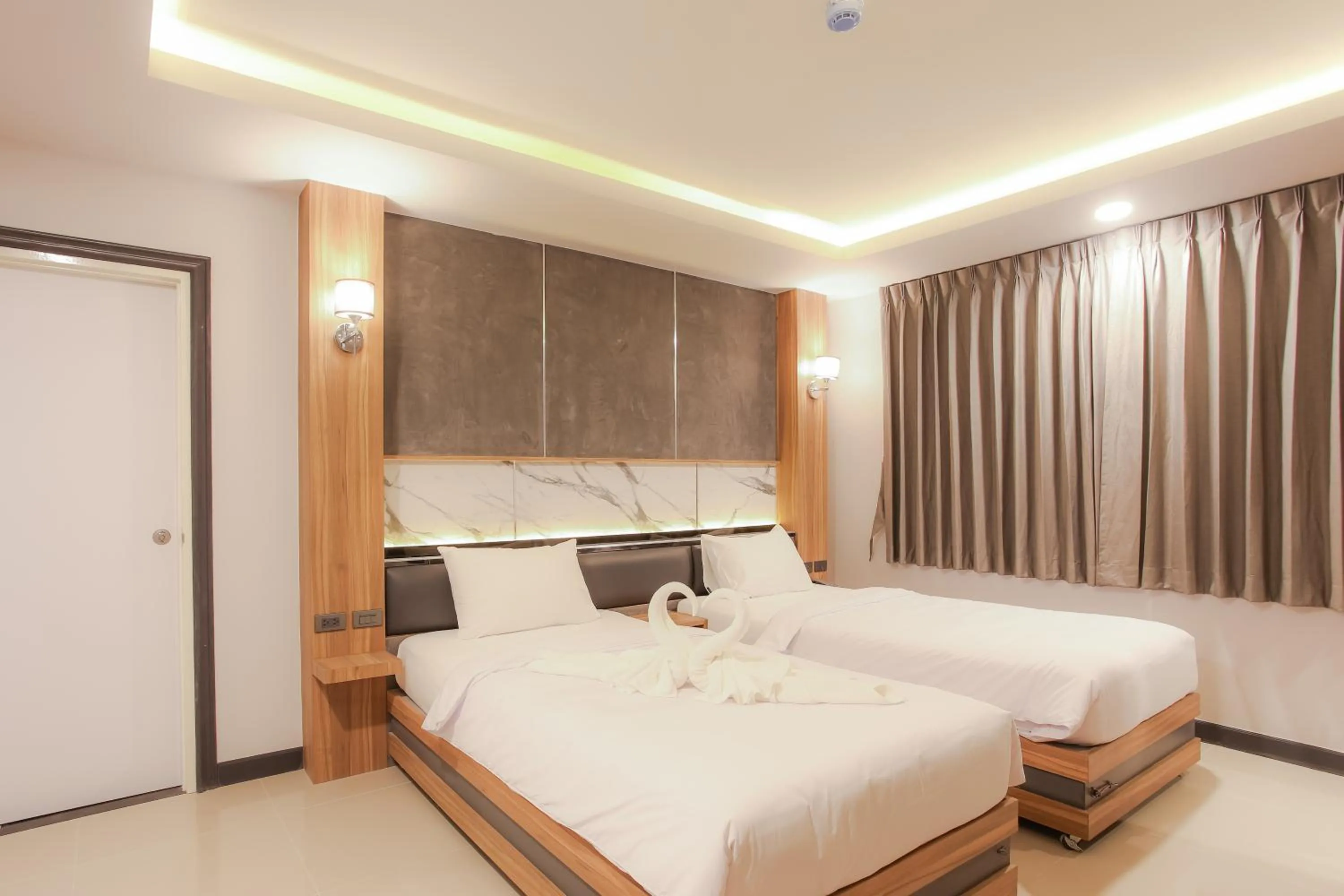 Bed in The Mantra Hotel Kata Noi