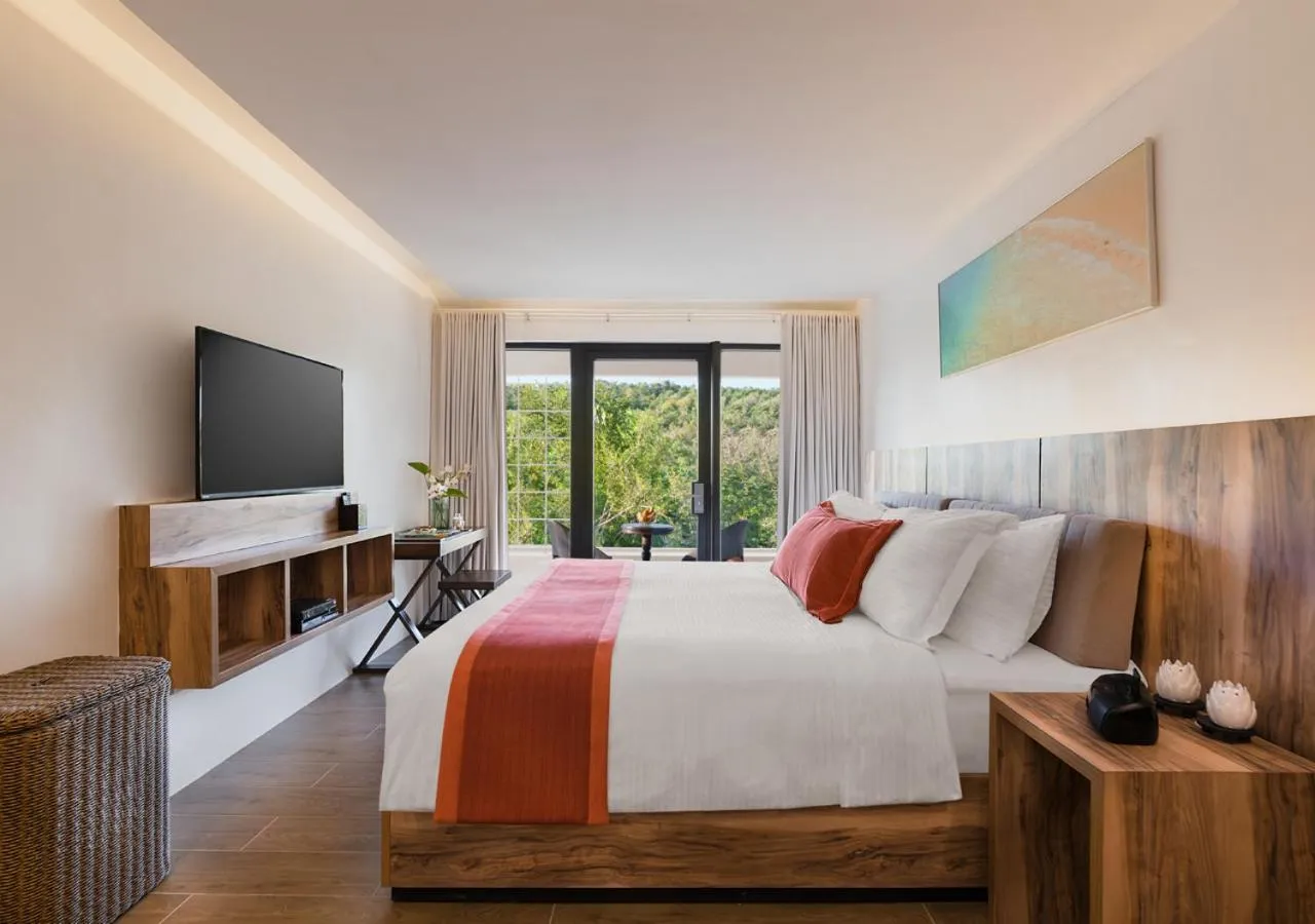 Photo of the whole room, Bed in Discovery Coron formerly Club Paradise Palawan