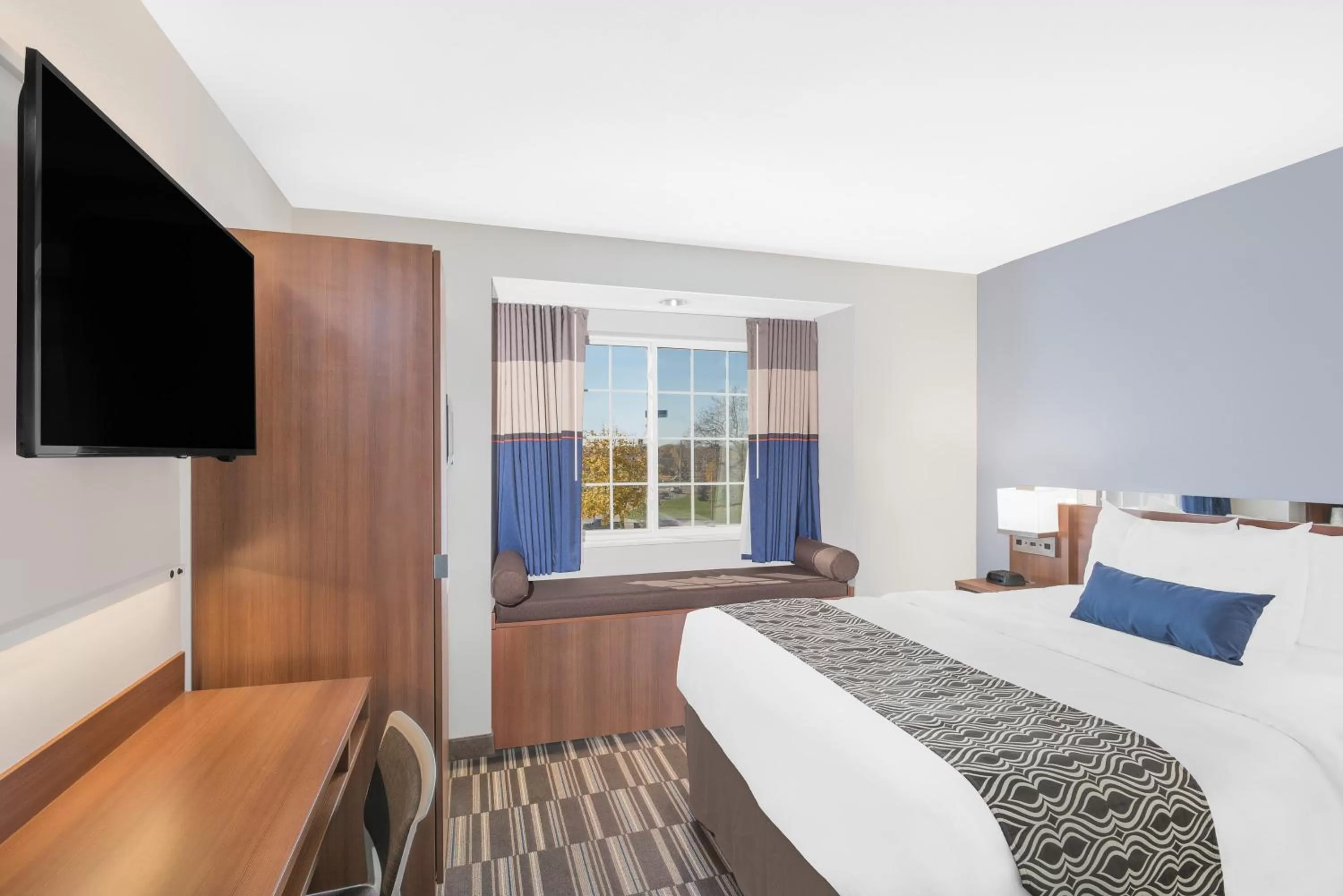 Photo of the whole room, Bed in Microtel Inn & Suites by Wyndham Binghamton