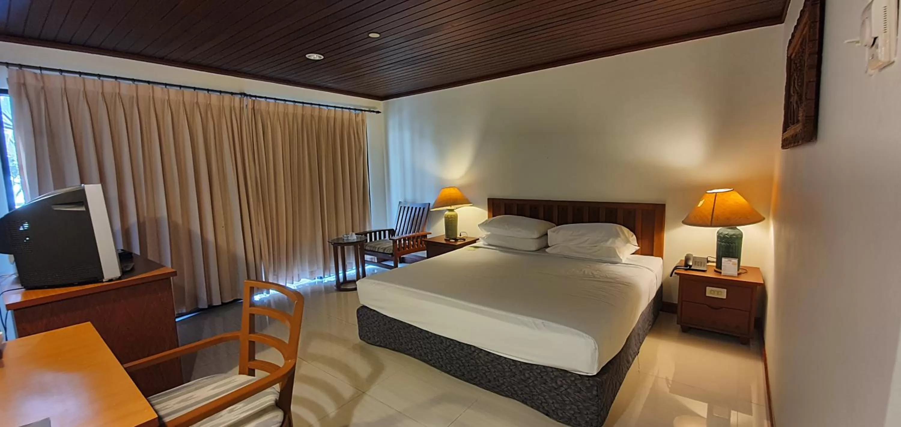 Bed in Garden Sea View Resort