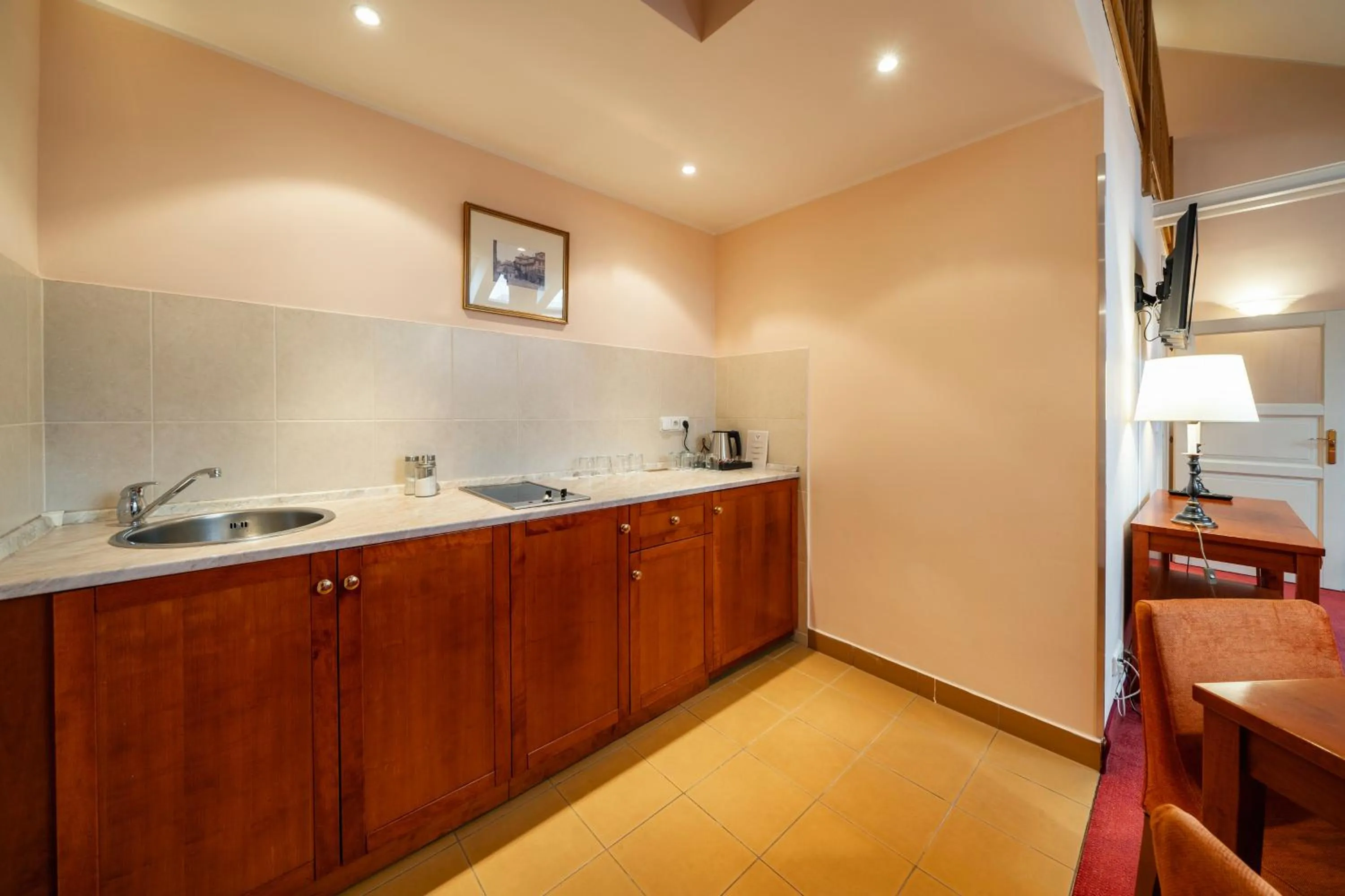 Kitchen or kitchenette in Hotel Raffaello Prague