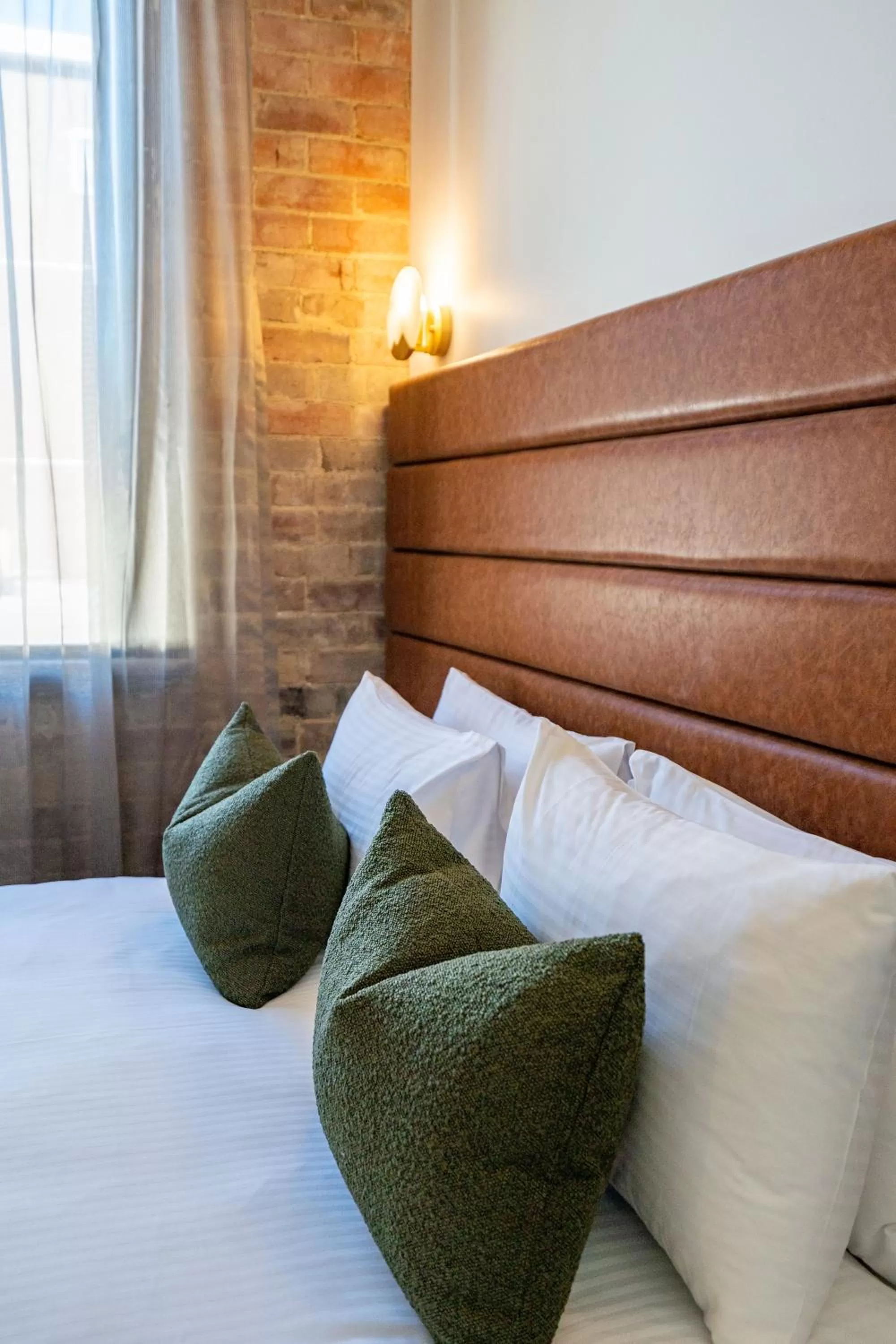 Bed in Grand Hotel and Studios