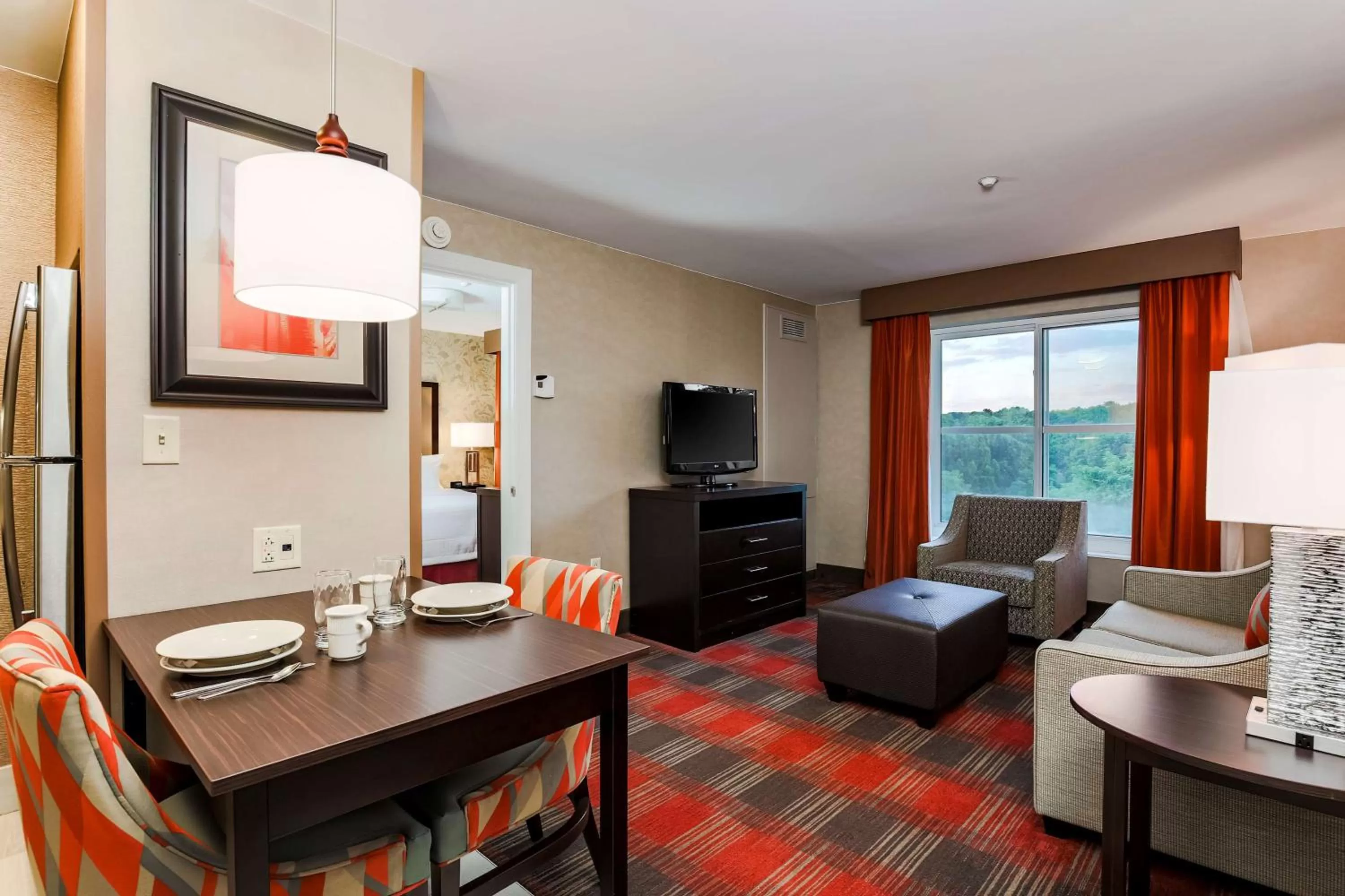 Living room in Homewood Suites by Hilton Long Island-Melville