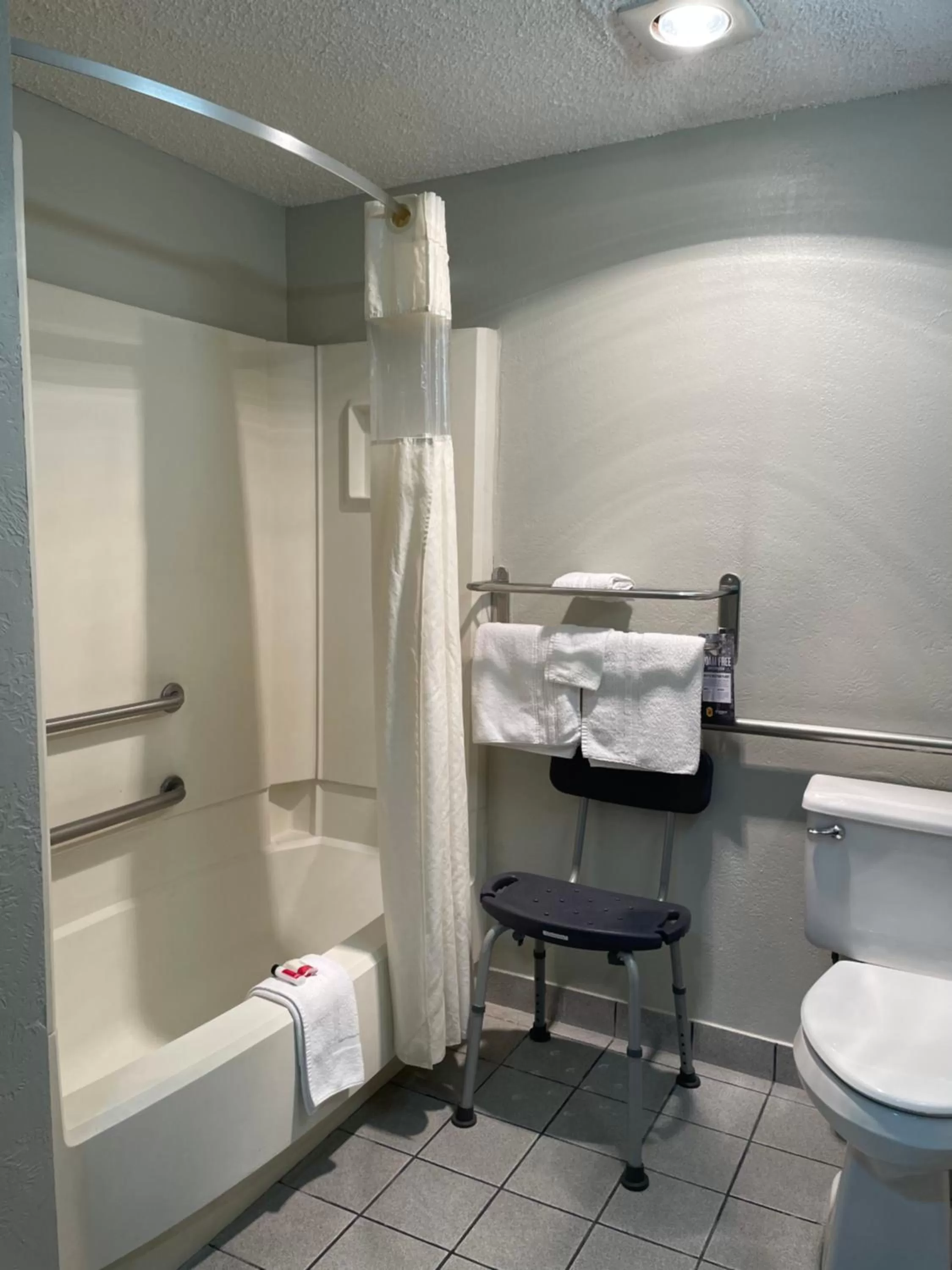 Bathroom in Super 8 by Wyndham Amarillo Central TX